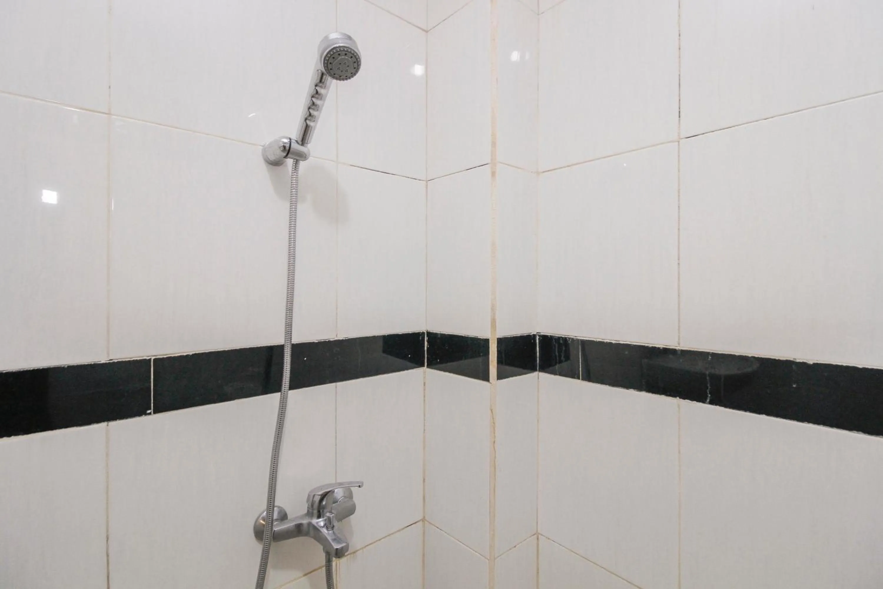 Bathroom in RedDoorz near Taman Samarendah Samarinda