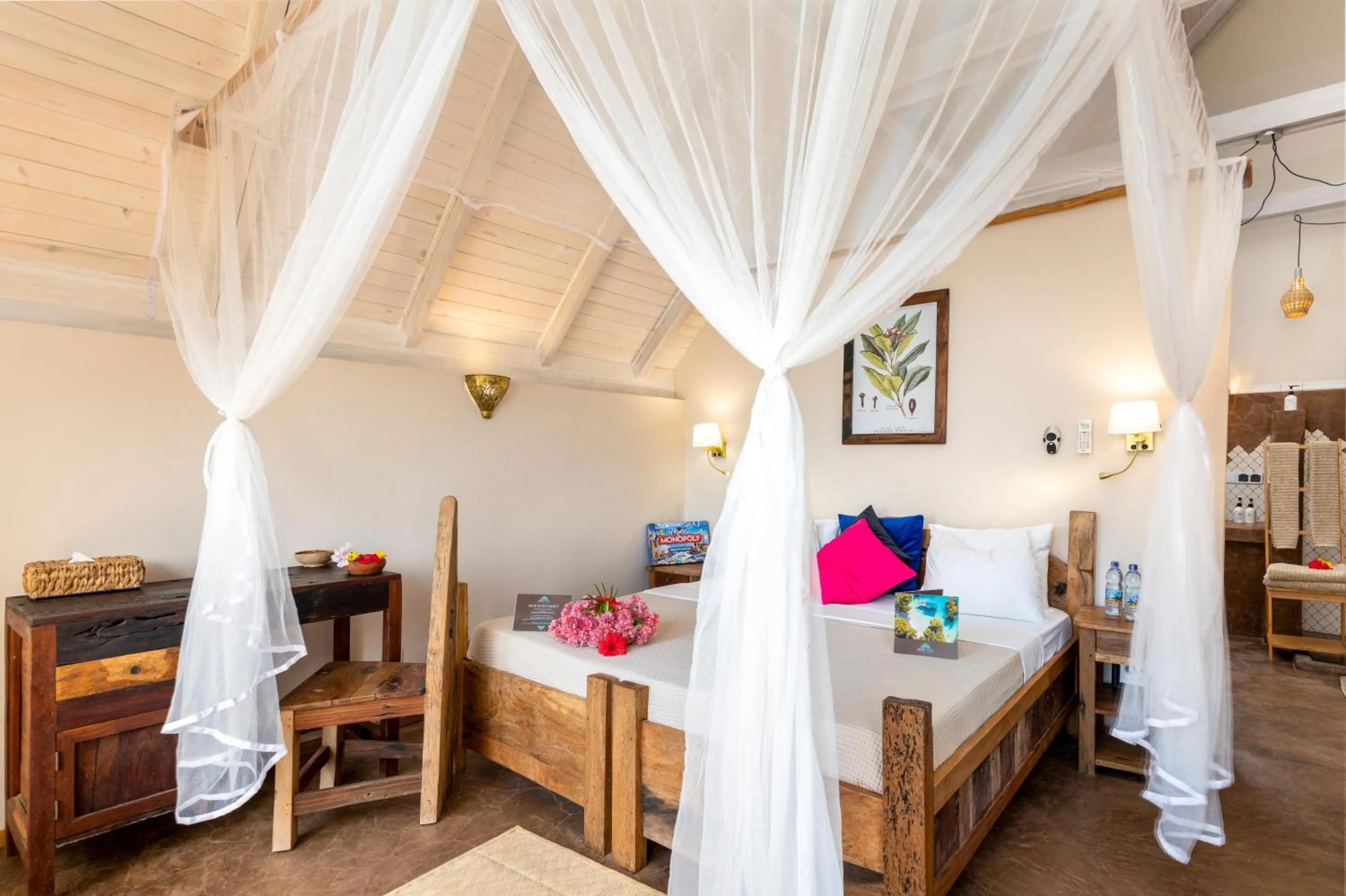 Bed in Clove Island Villas & Spa