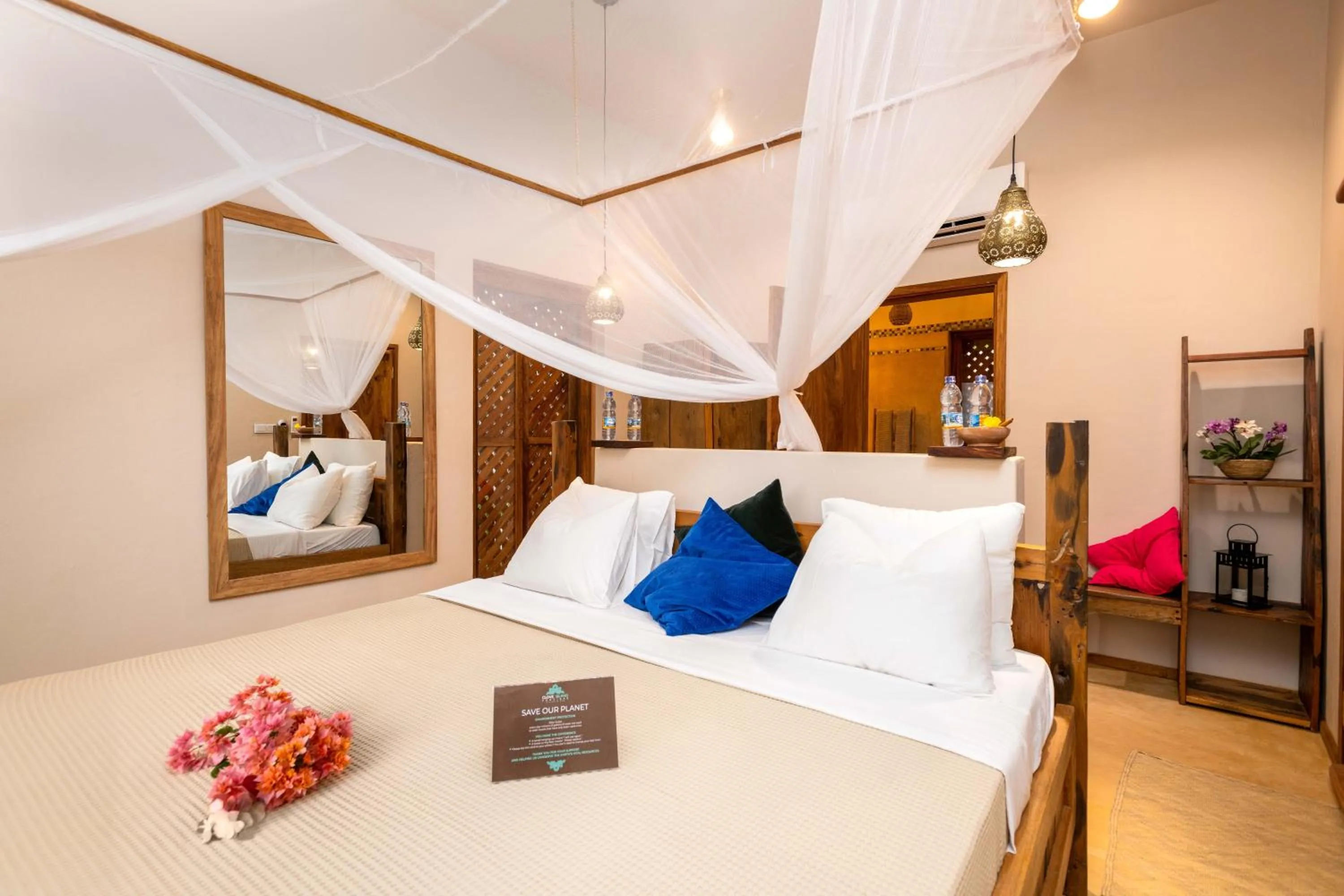Bed in Clove Island Villas & Spa