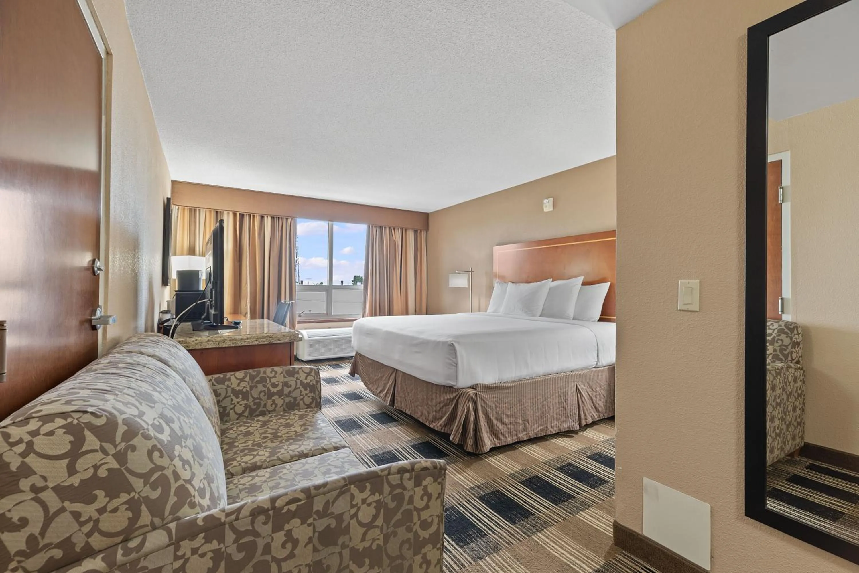 Bed in Hotel Executive Suites