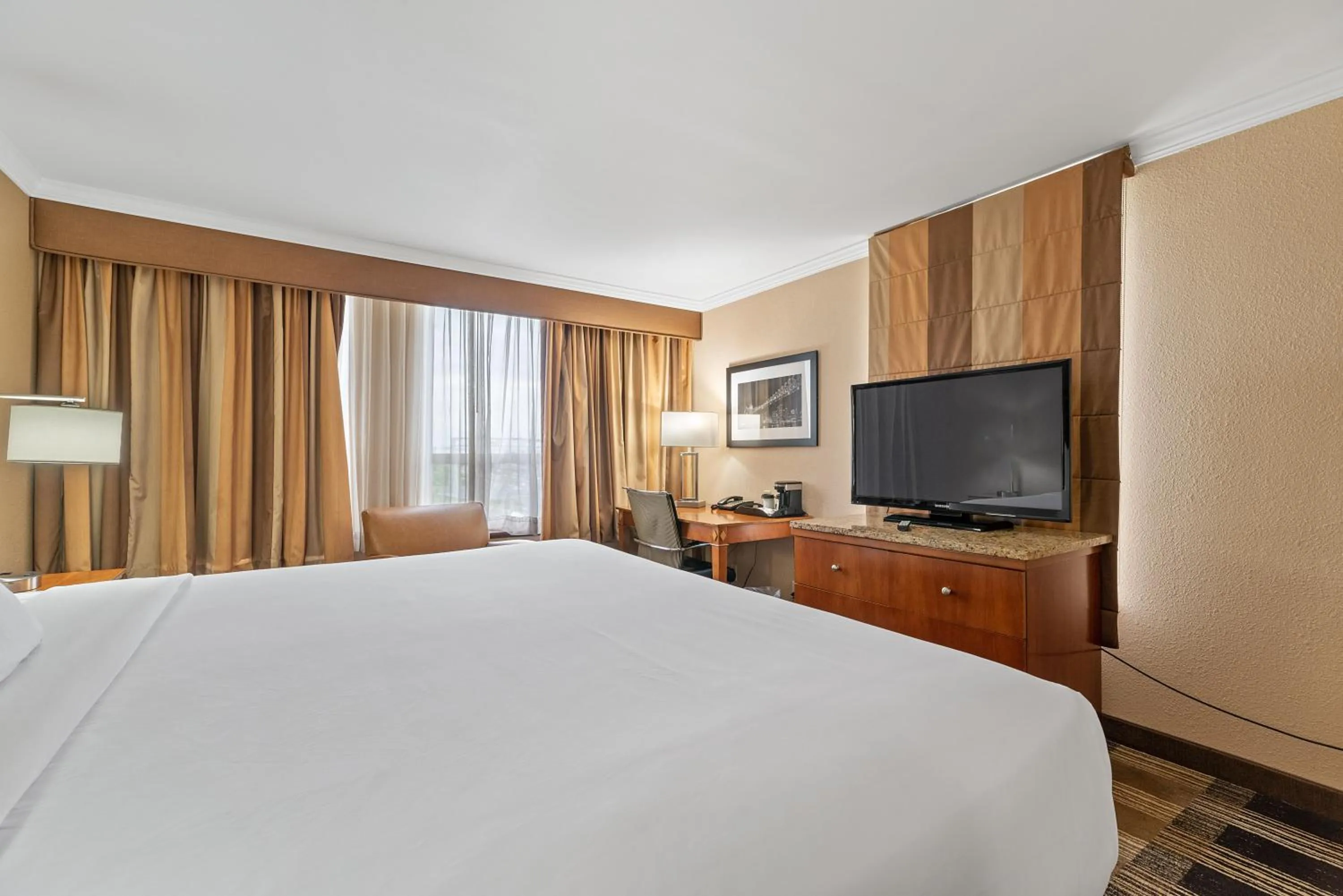 Bed in Hotel Executive Suites