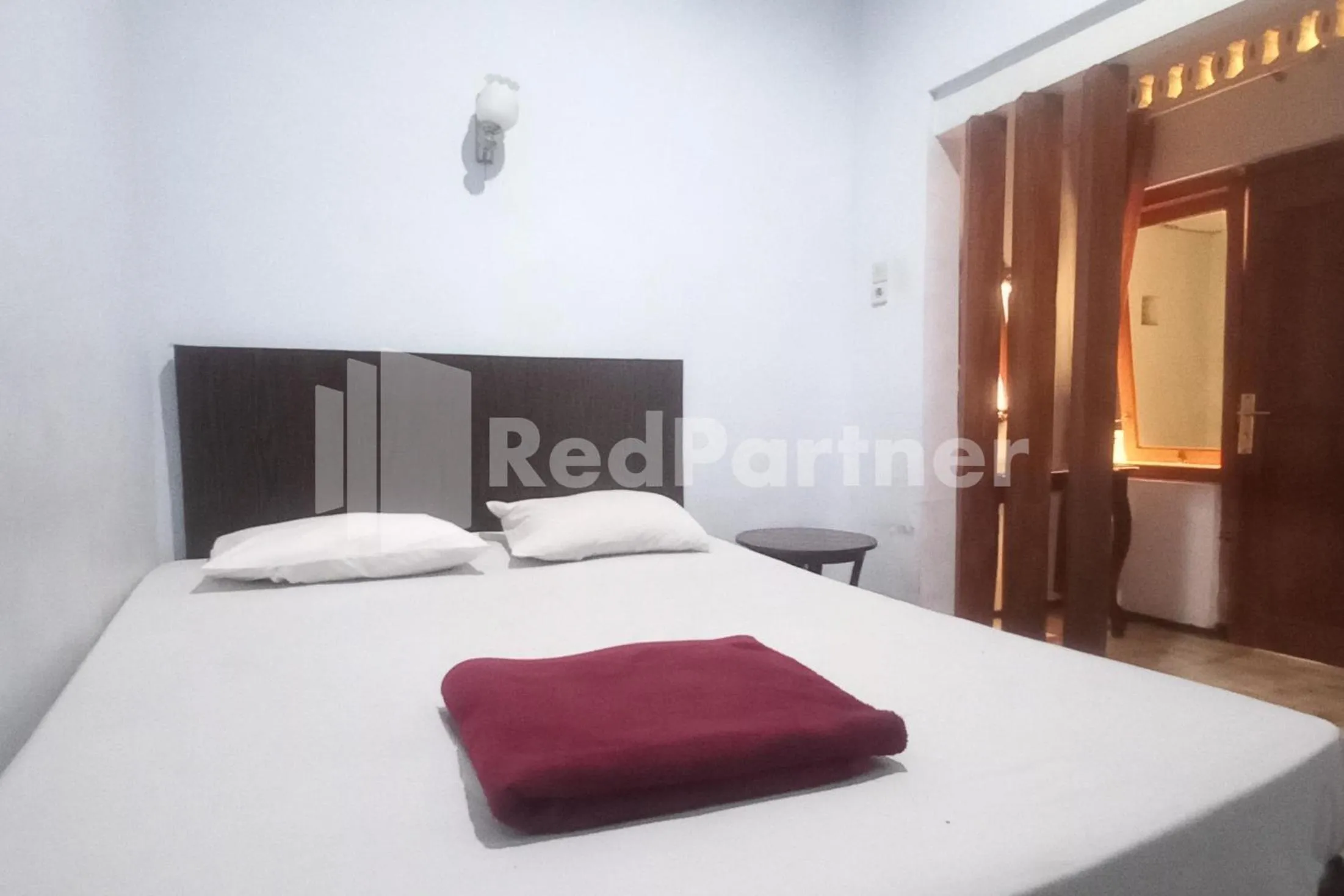Bedroom, Bed in Hotel Palem 2 Syariah Malang Redpartner