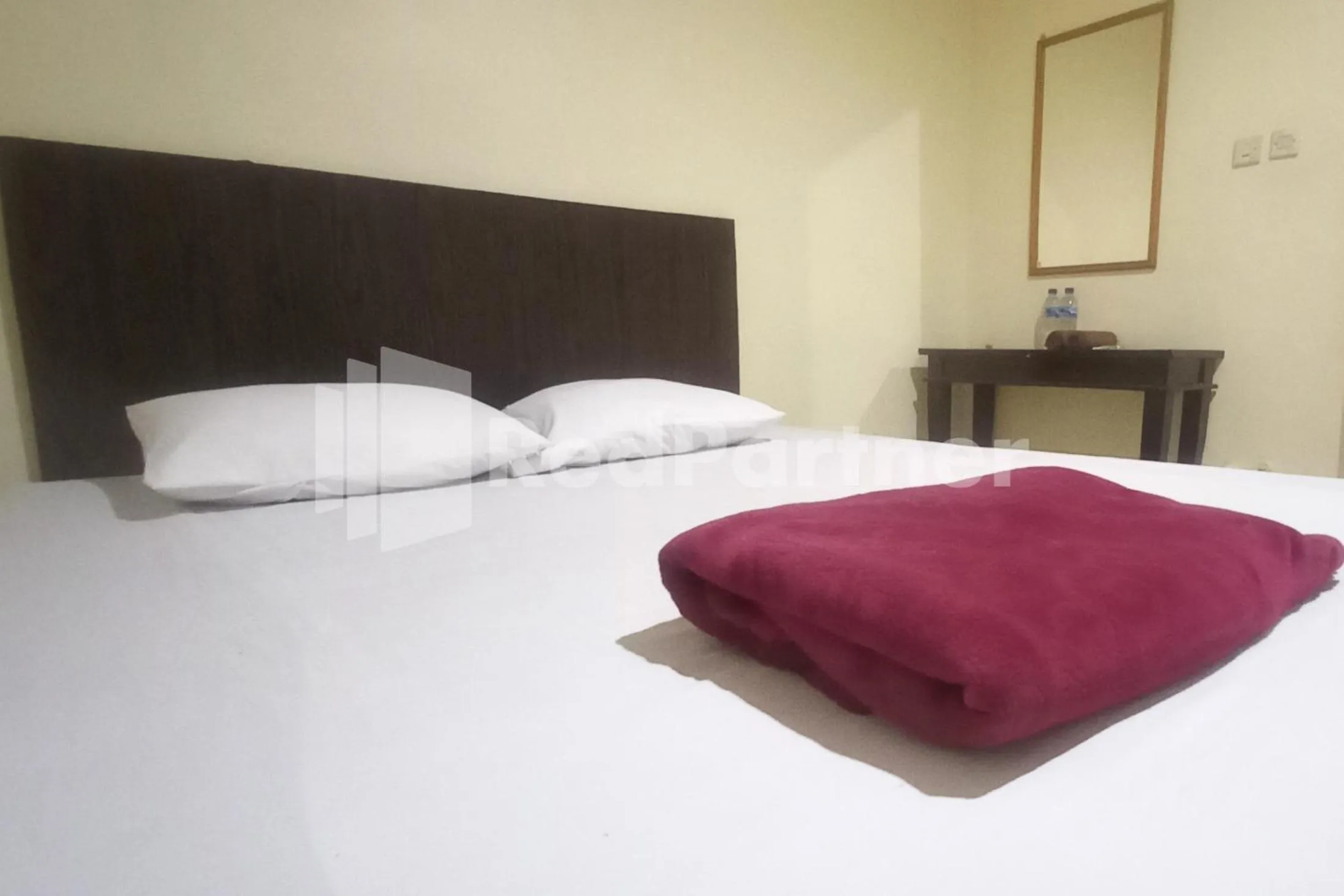 Bedroom, Bed in Hotel Palem 2 Syariah Malang Redpartner