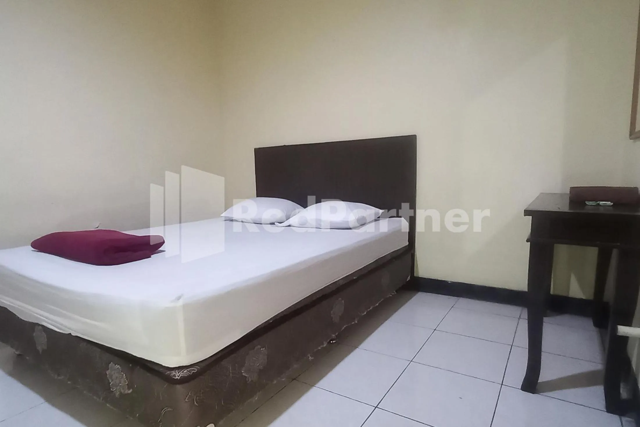 Bedroom, Bed in Hotel Palem 2 Syariah Malang Redpartner