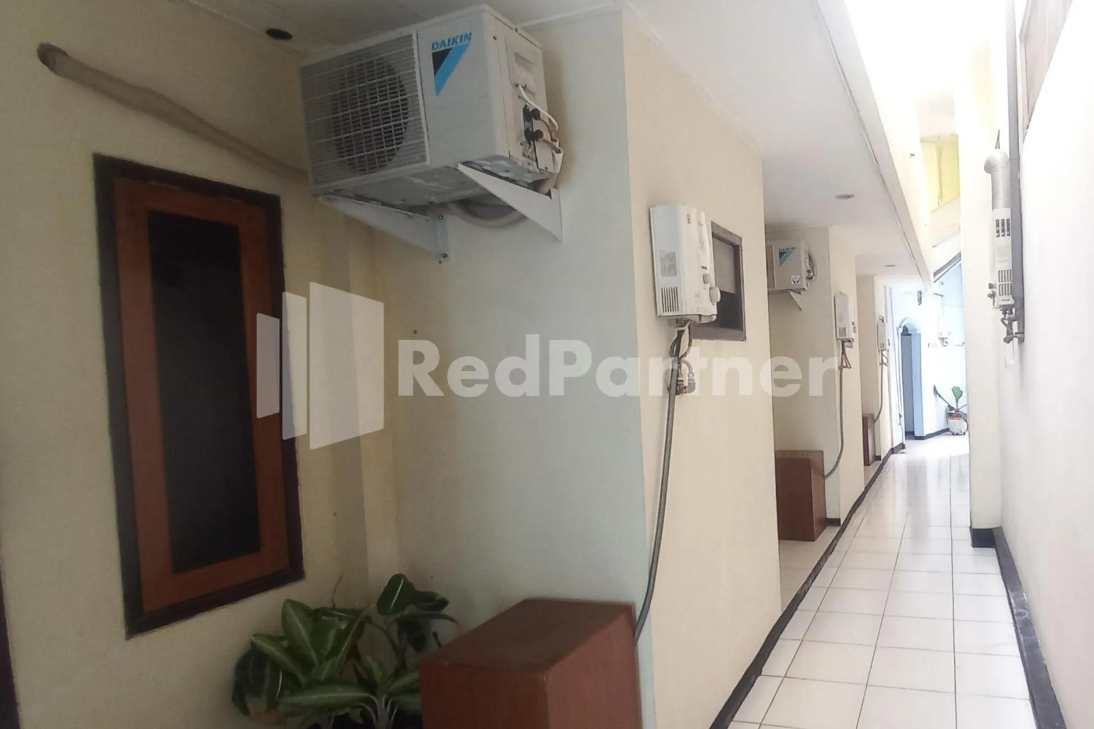 Lobby or reception in Hotel Palem 2 Syariah Malang Redpartner