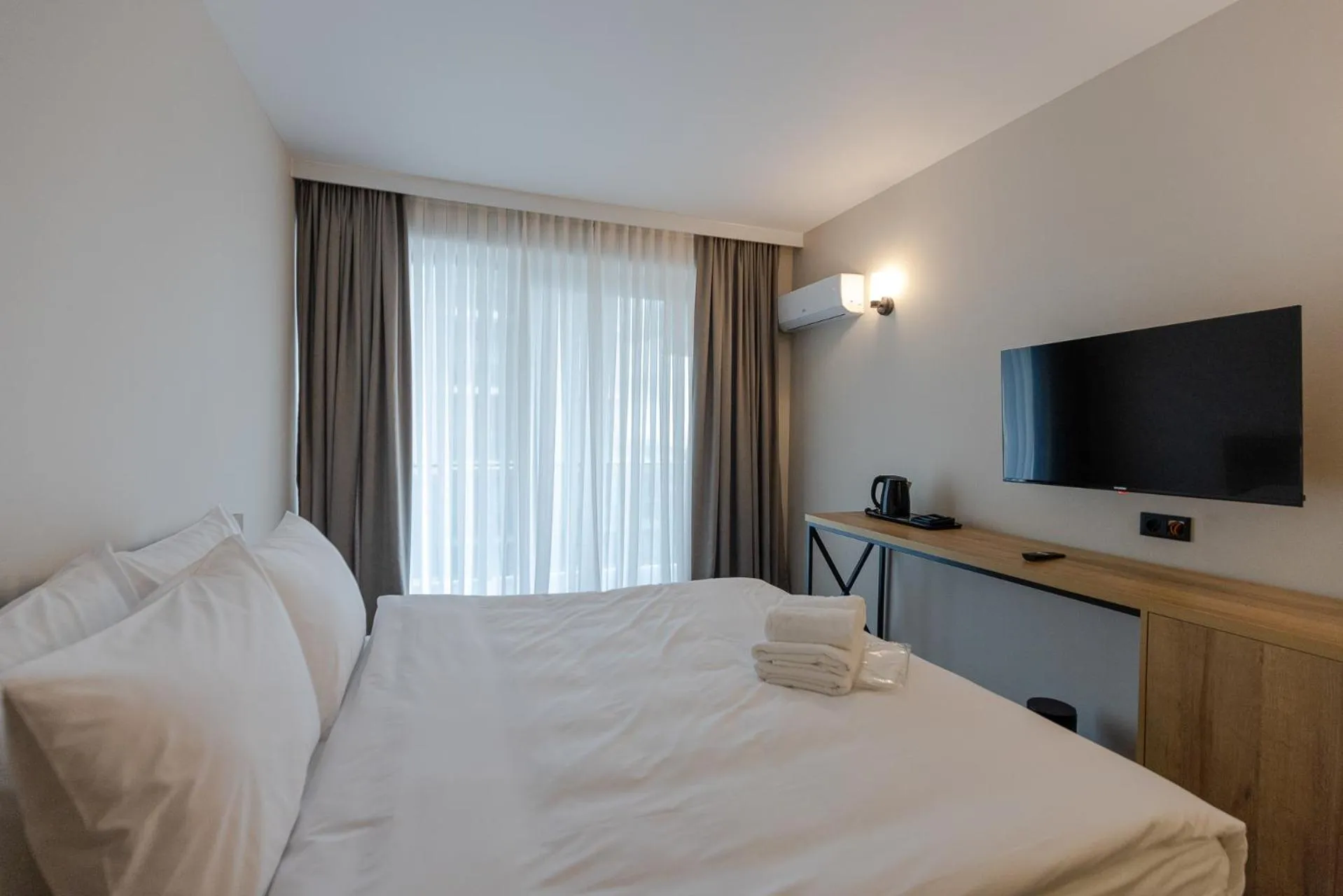 Bed in Aqua Batumi Hotel & Apartments