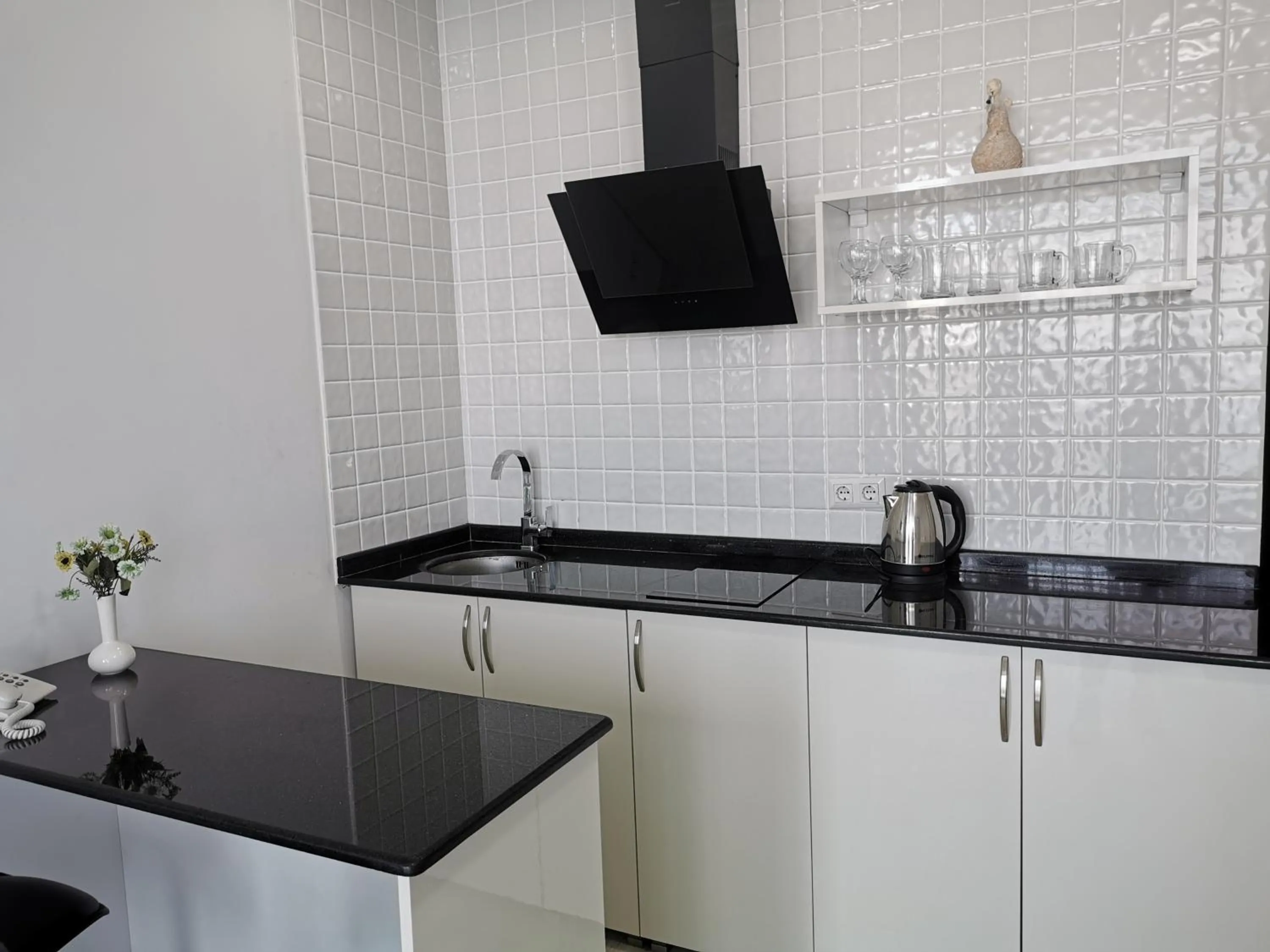 Kitchen or kitchenette in Aqua Batumi Hotel & Apartments