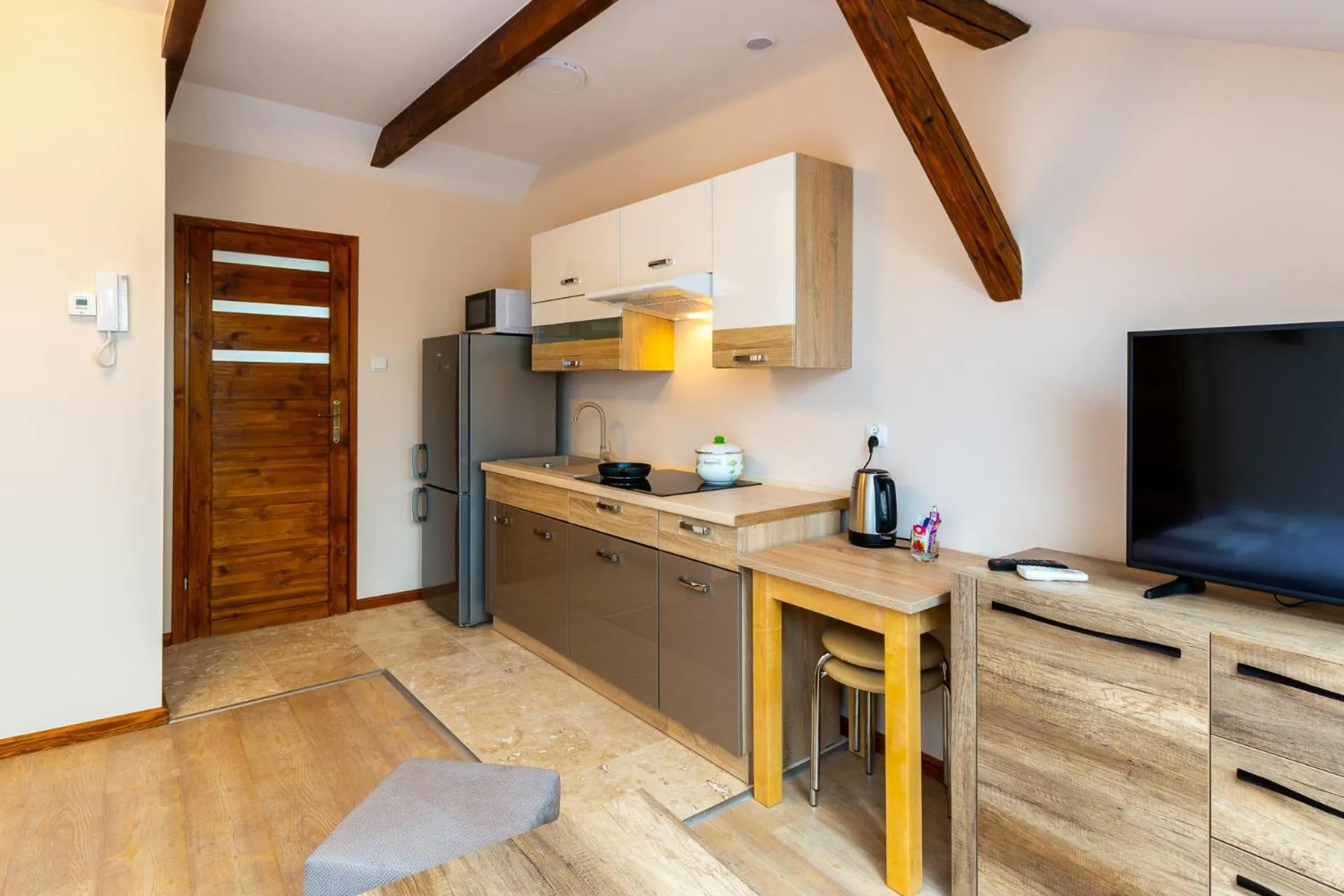 Kitchen or kitchenette in Apartamenty Galicja