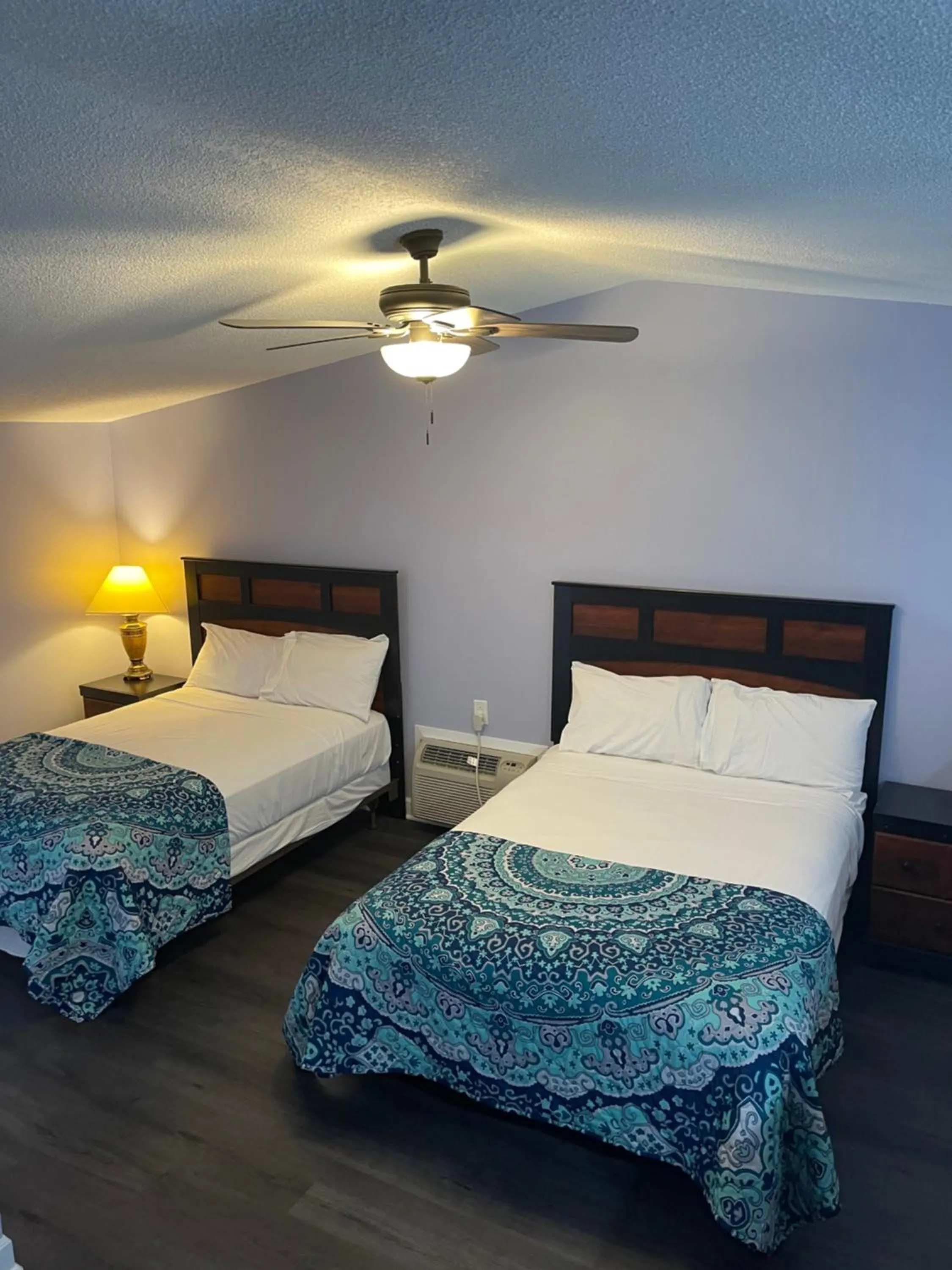 Bed in Caribbean Club Resort