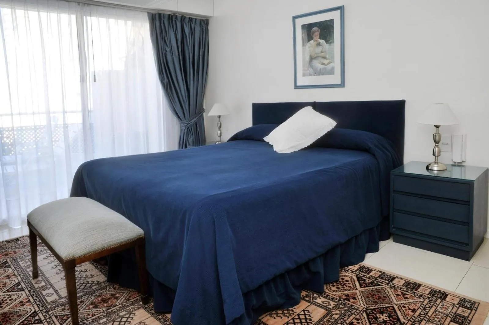 Bed in Mayla Apartments