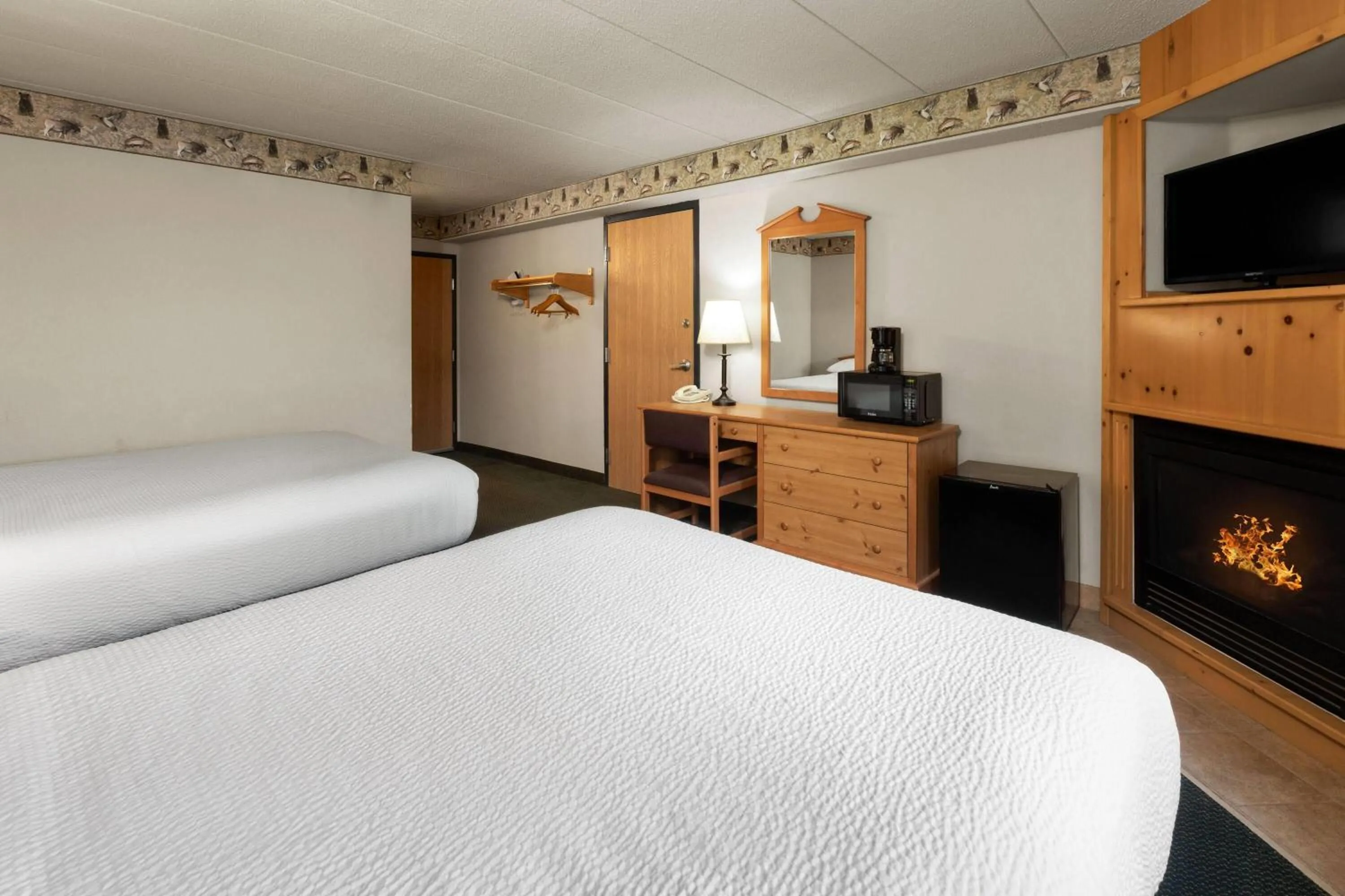 Photo of the whole room, Bed in Shell Lake Lodge, a Travelodge by Wyndham