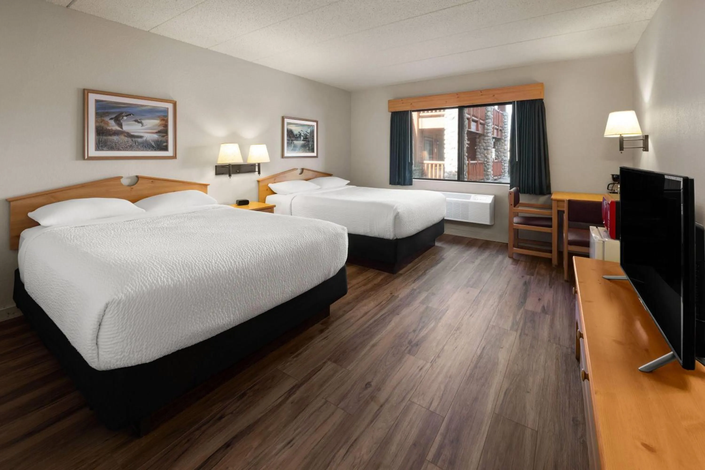 Photo of the whole room, Bed in Shell Lake Lodge, a Travelodge by Wyndham