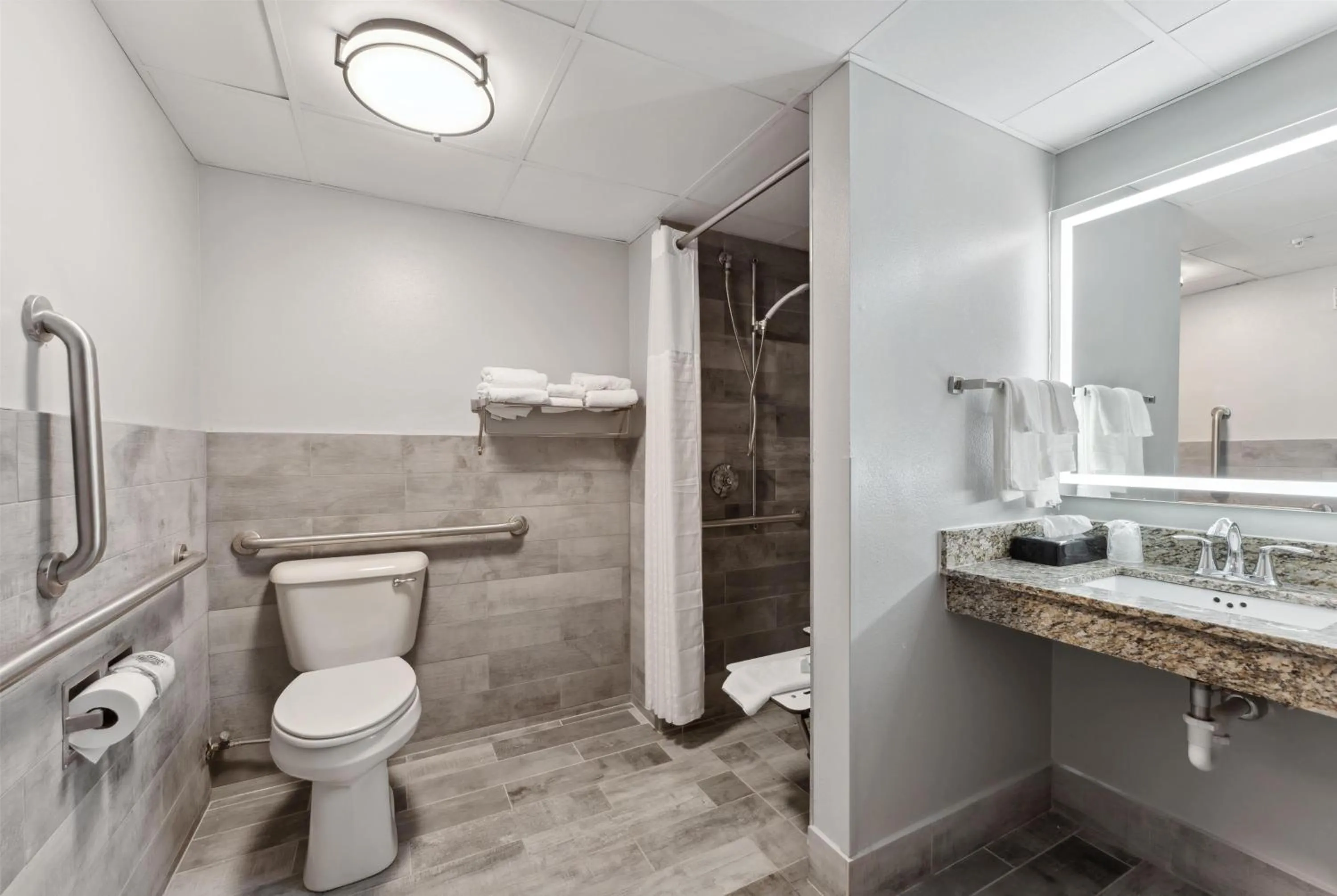 Bathroom in AmericInn by Wyndham Wisconsin Dells