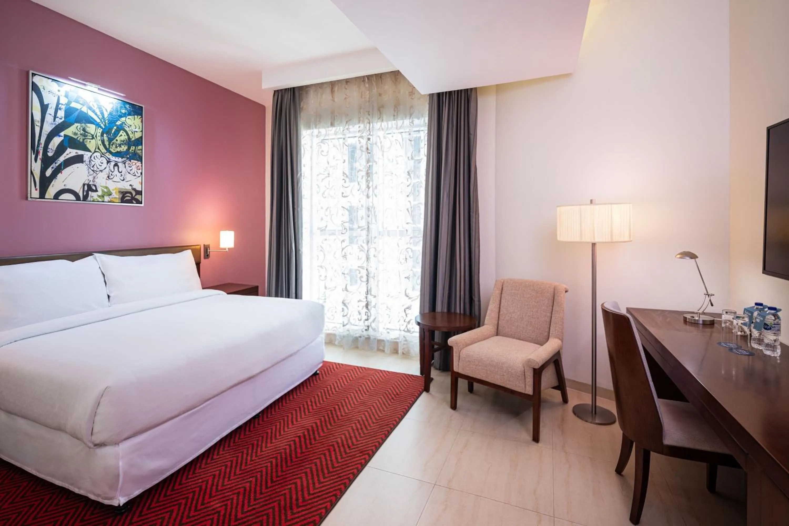 Photo of the whole room, Bed in Four Points by Sheraton Sharjah