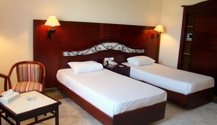 Bed in Royal Brayka Beach Resort
