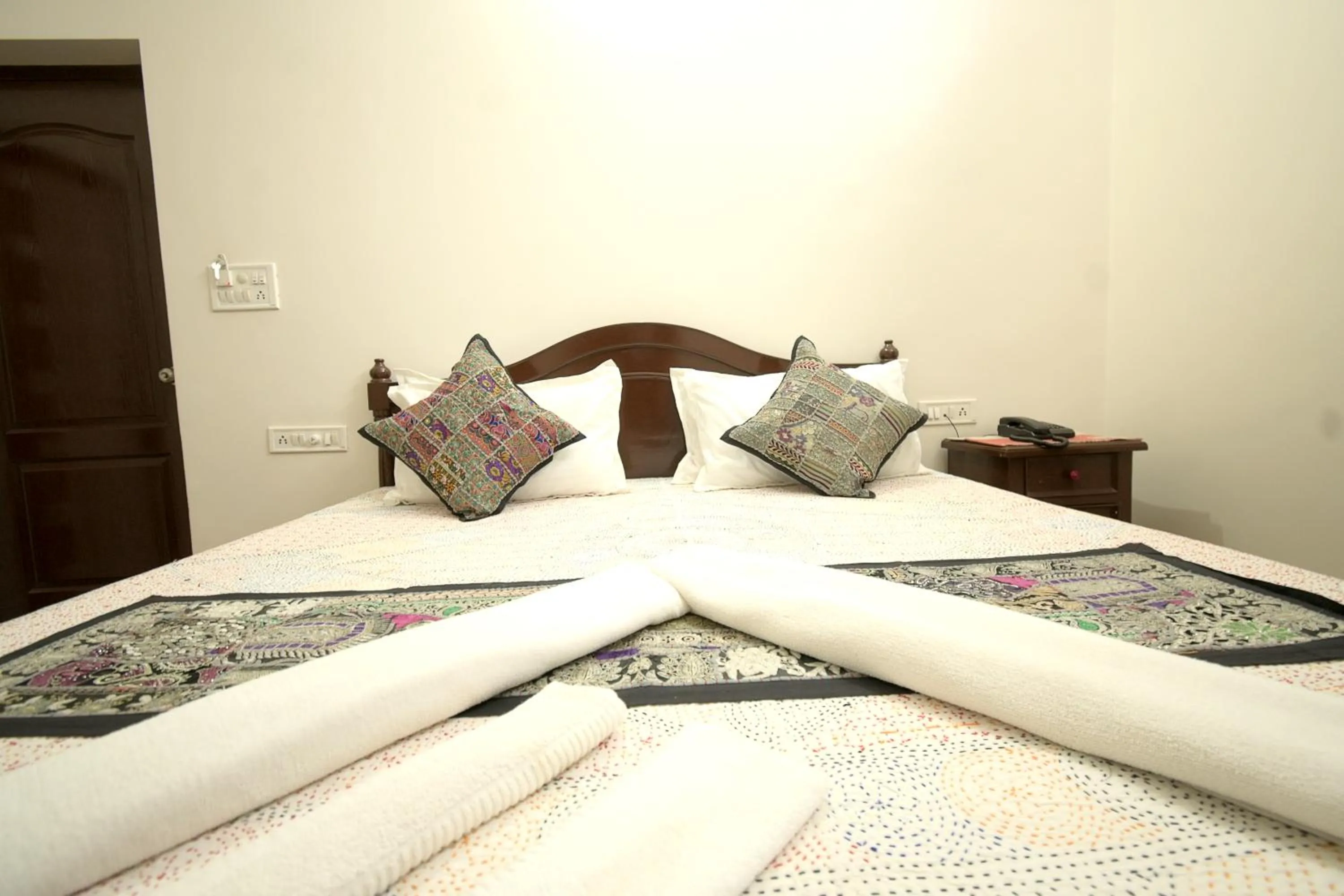 Bed in Hotel Sanjay Villas