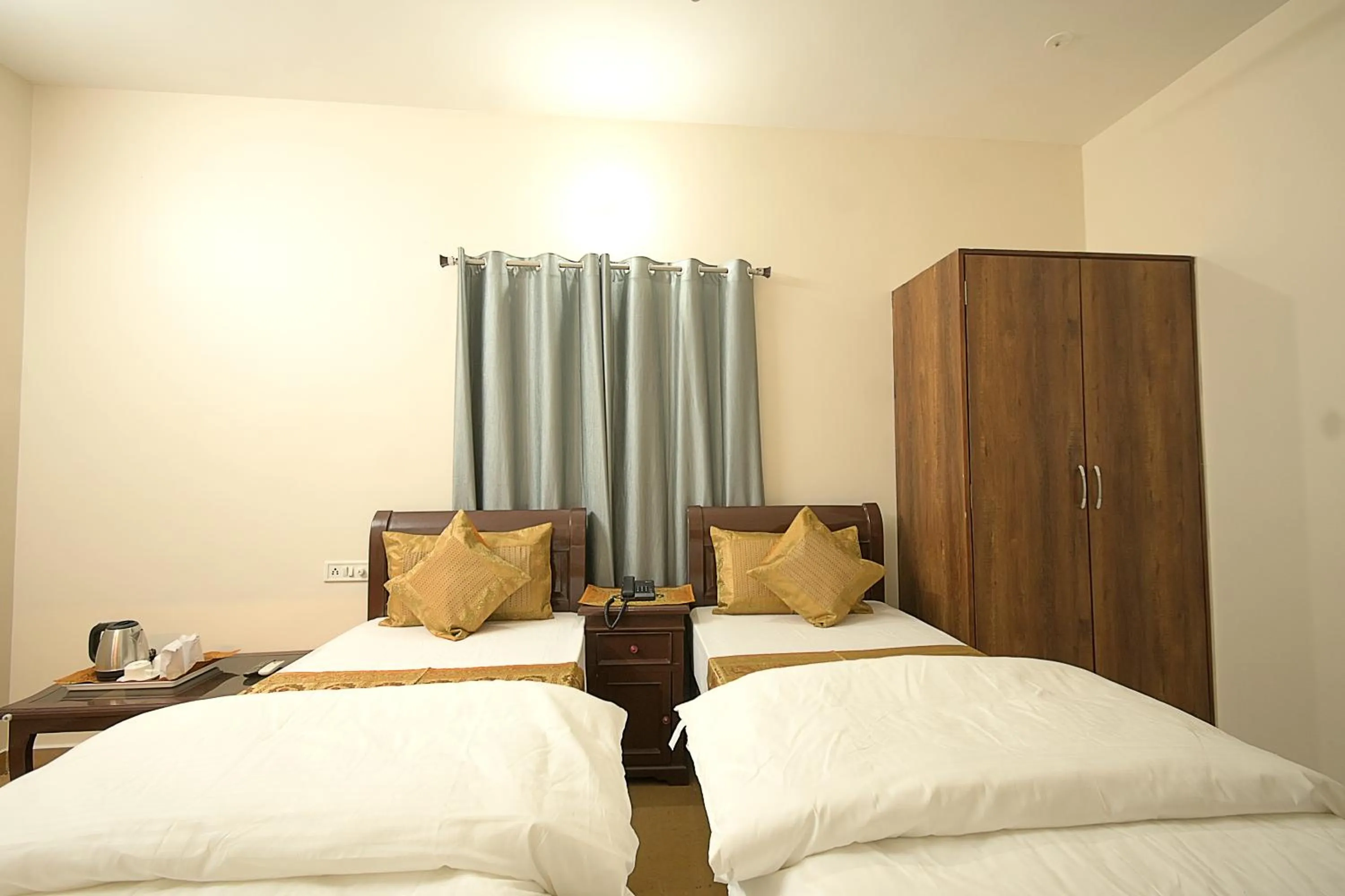Bed in Hotel Sanjay Villas