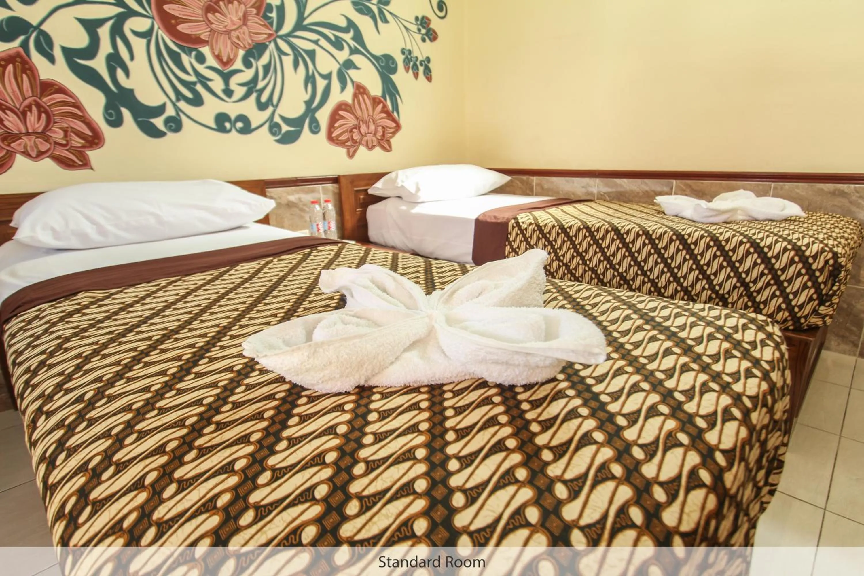 Seating area, Bed in Delta Homestay