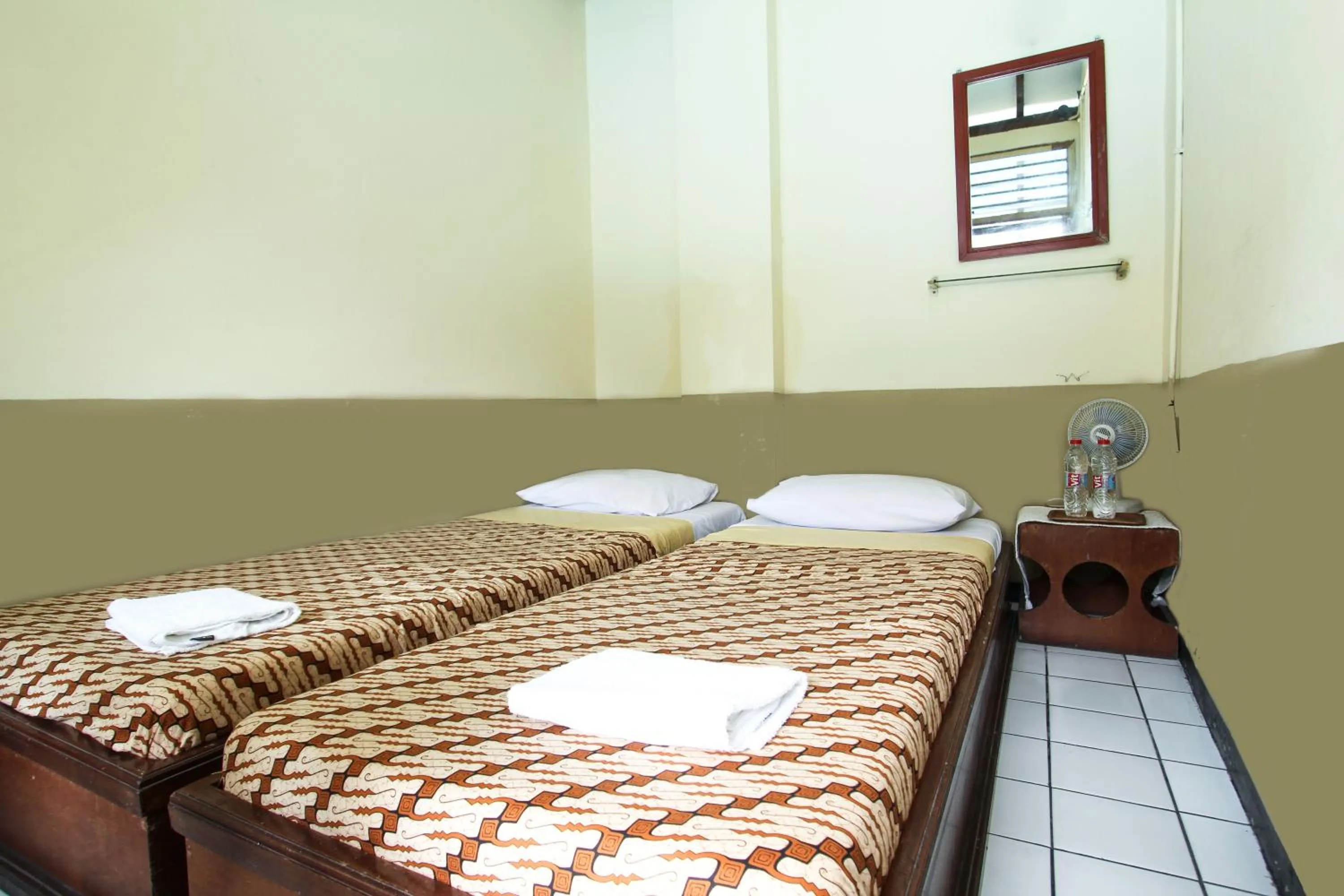 Seating area, Bed in Delta Homestay