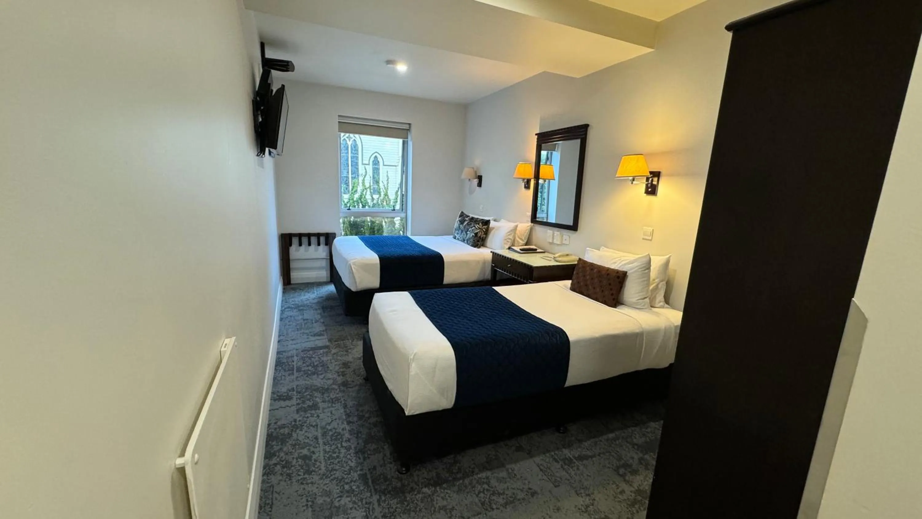 Photo of the whole room, Bed in Trinity Hotel