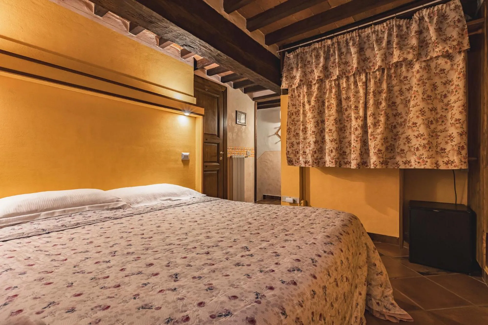 Photo of the whole room, Bed in Meublè Evoè