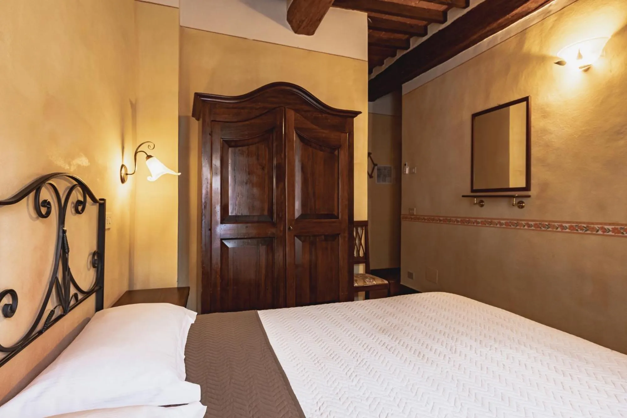 Bed in Meublè Evoè