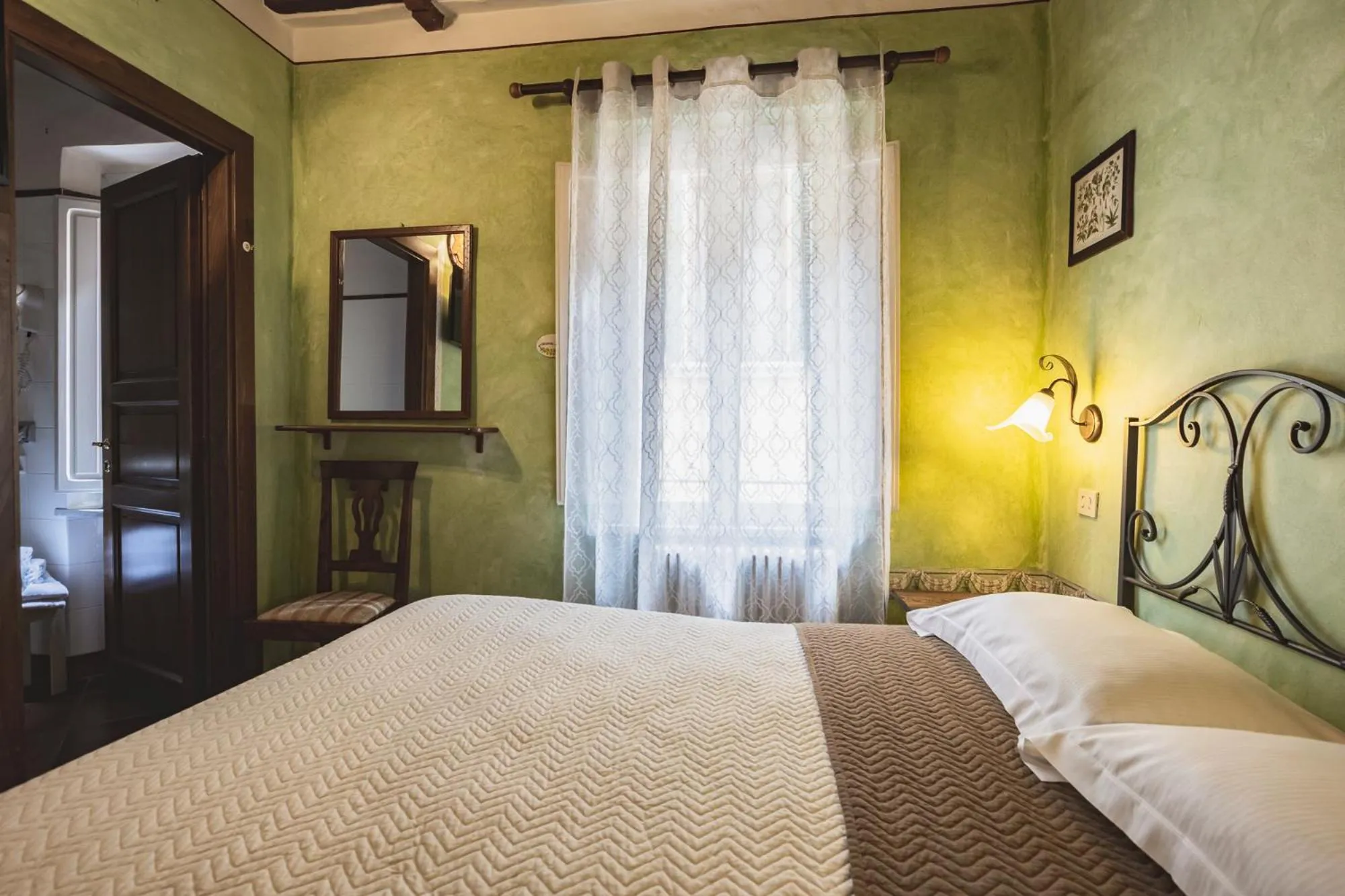 Photo of the whole room, Bed in Meublè Evoè