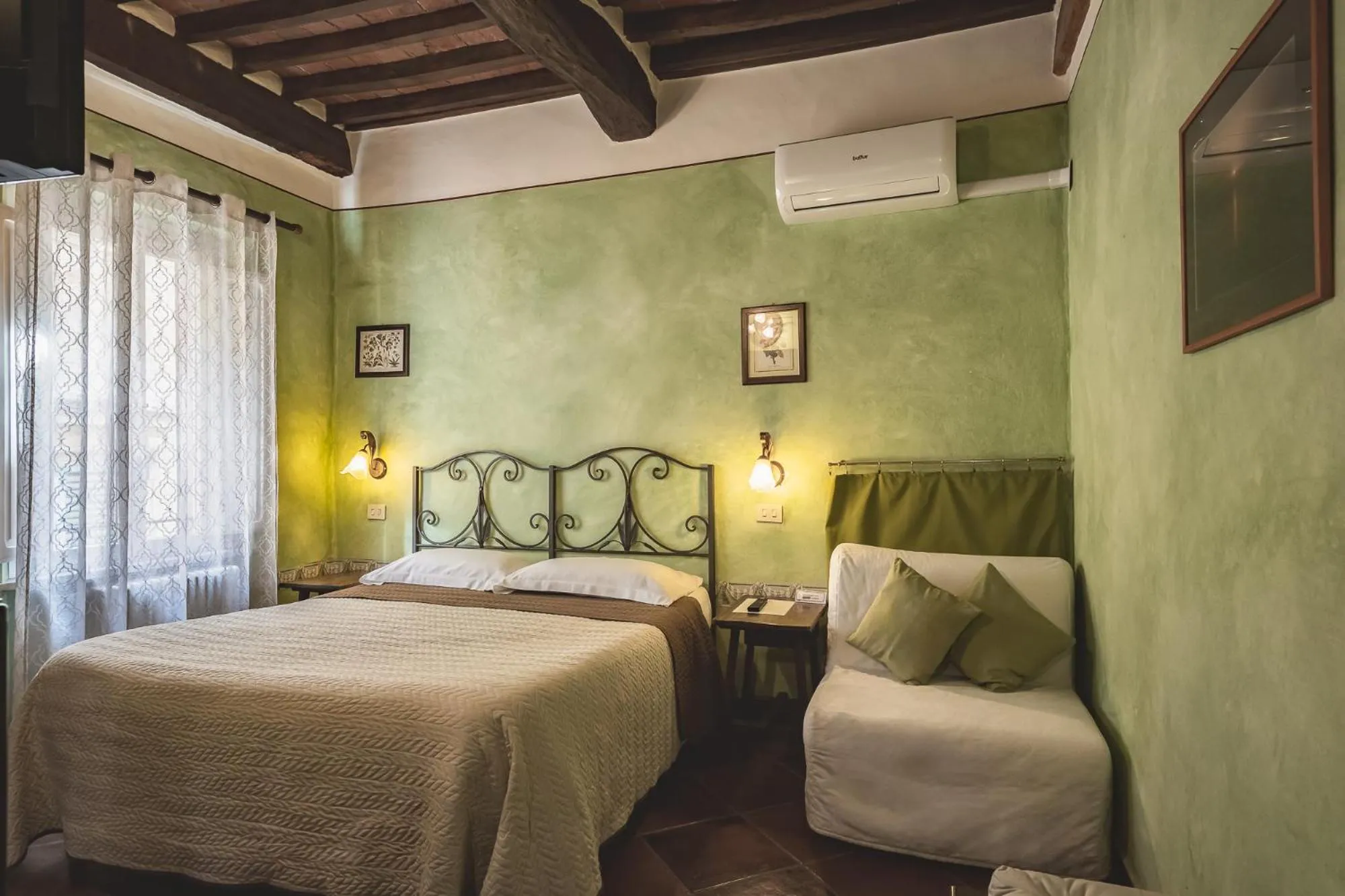 Bed in Meublè Evoè