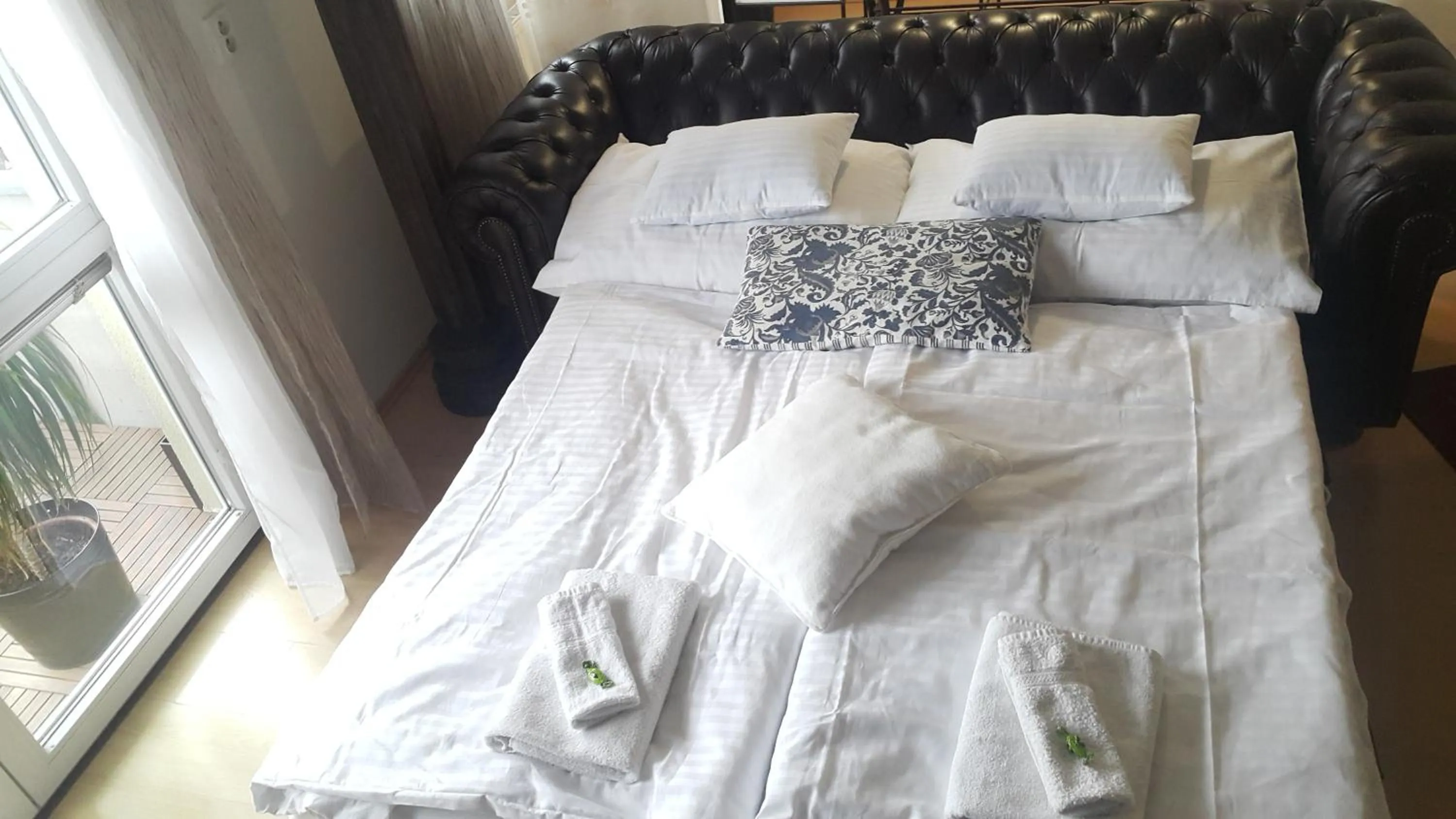 Bed in Richie Apartment near Aquapark