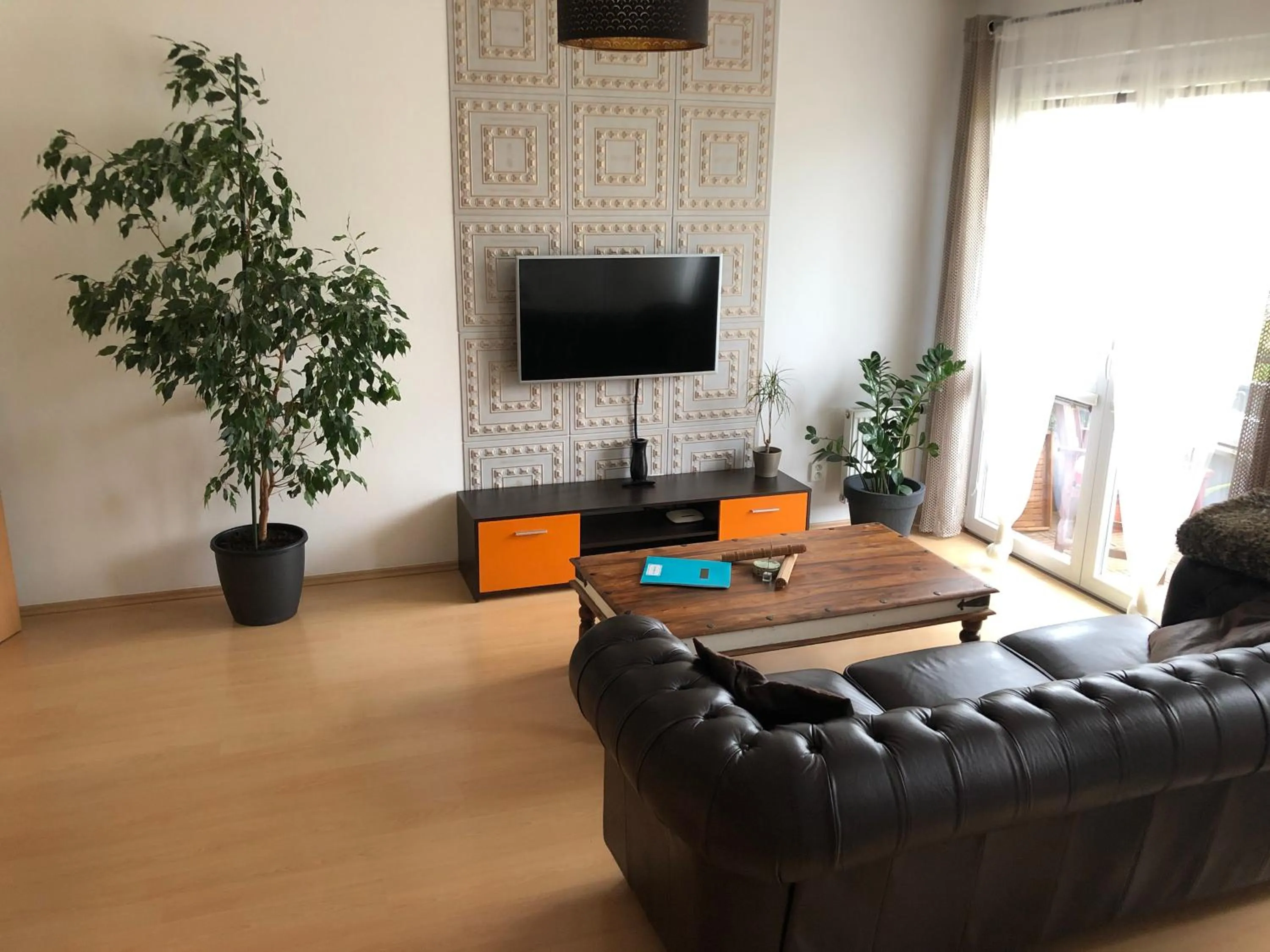 Living room in Richie Apartment near Aquapark