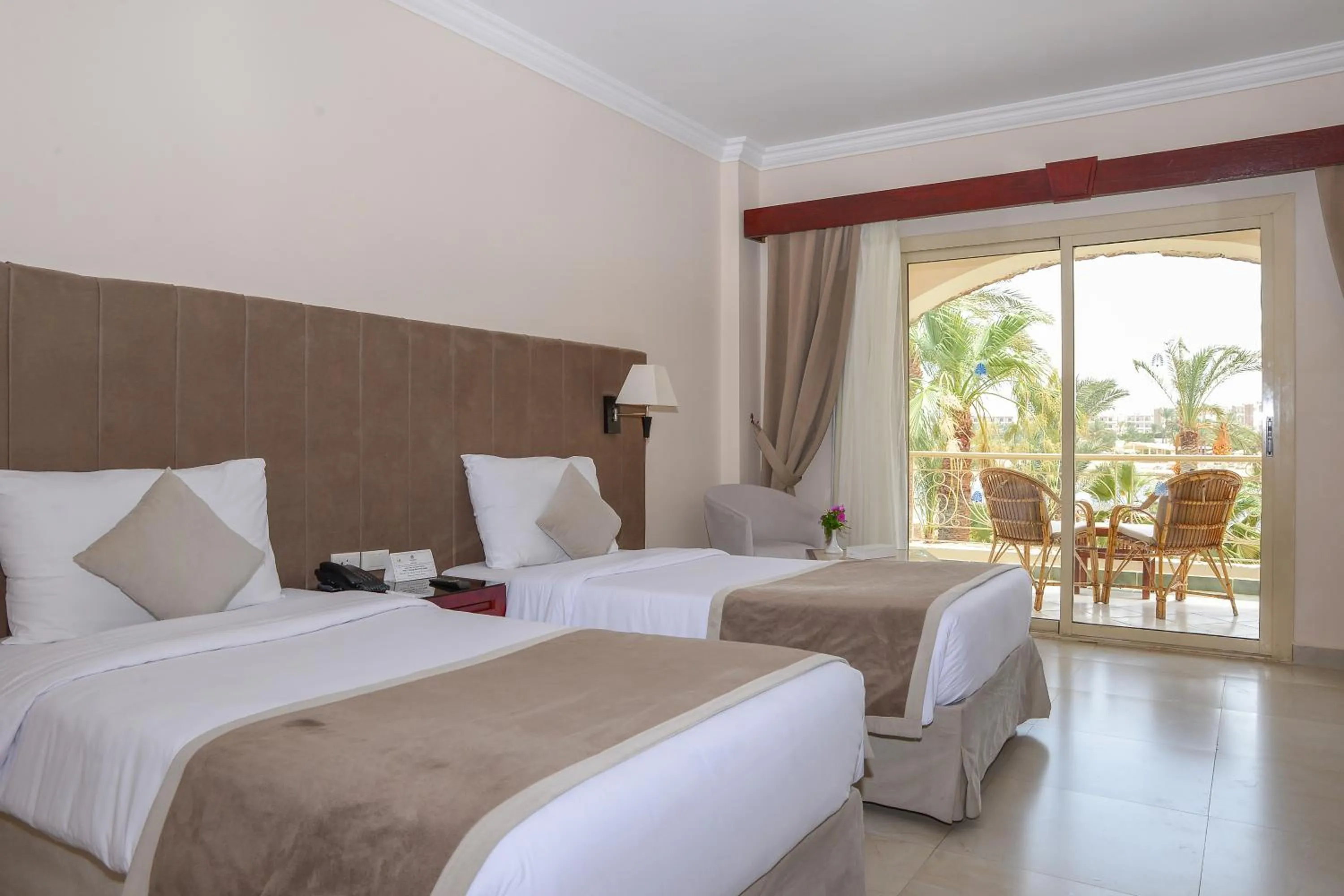 Bed in Brayka Bay Reef Resort