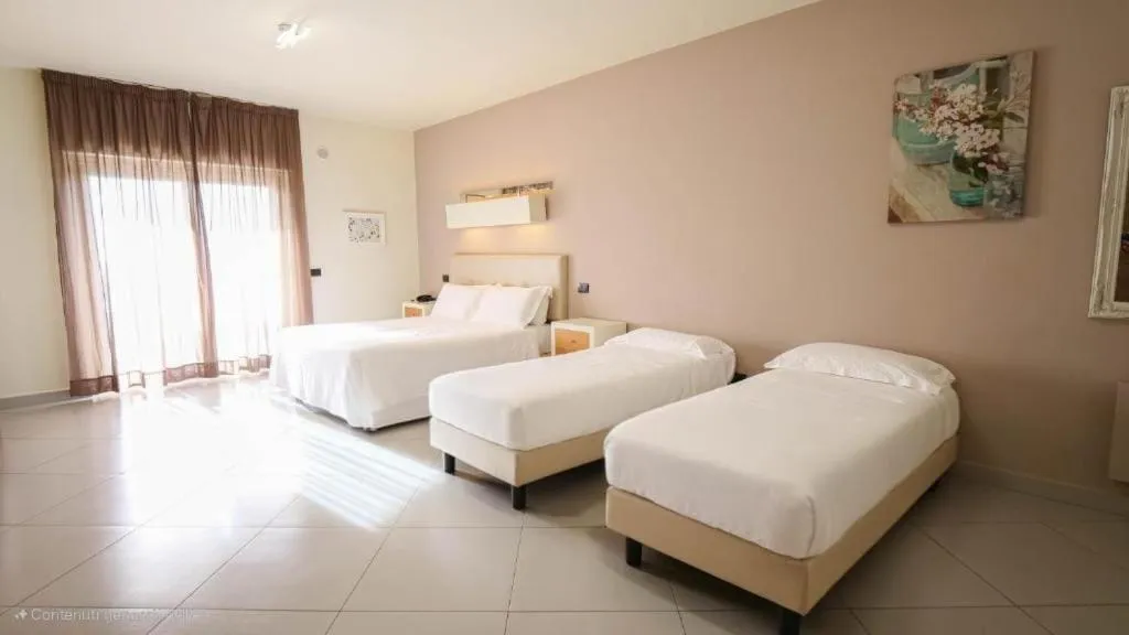 Bed in 4 Spa Resort Hotel