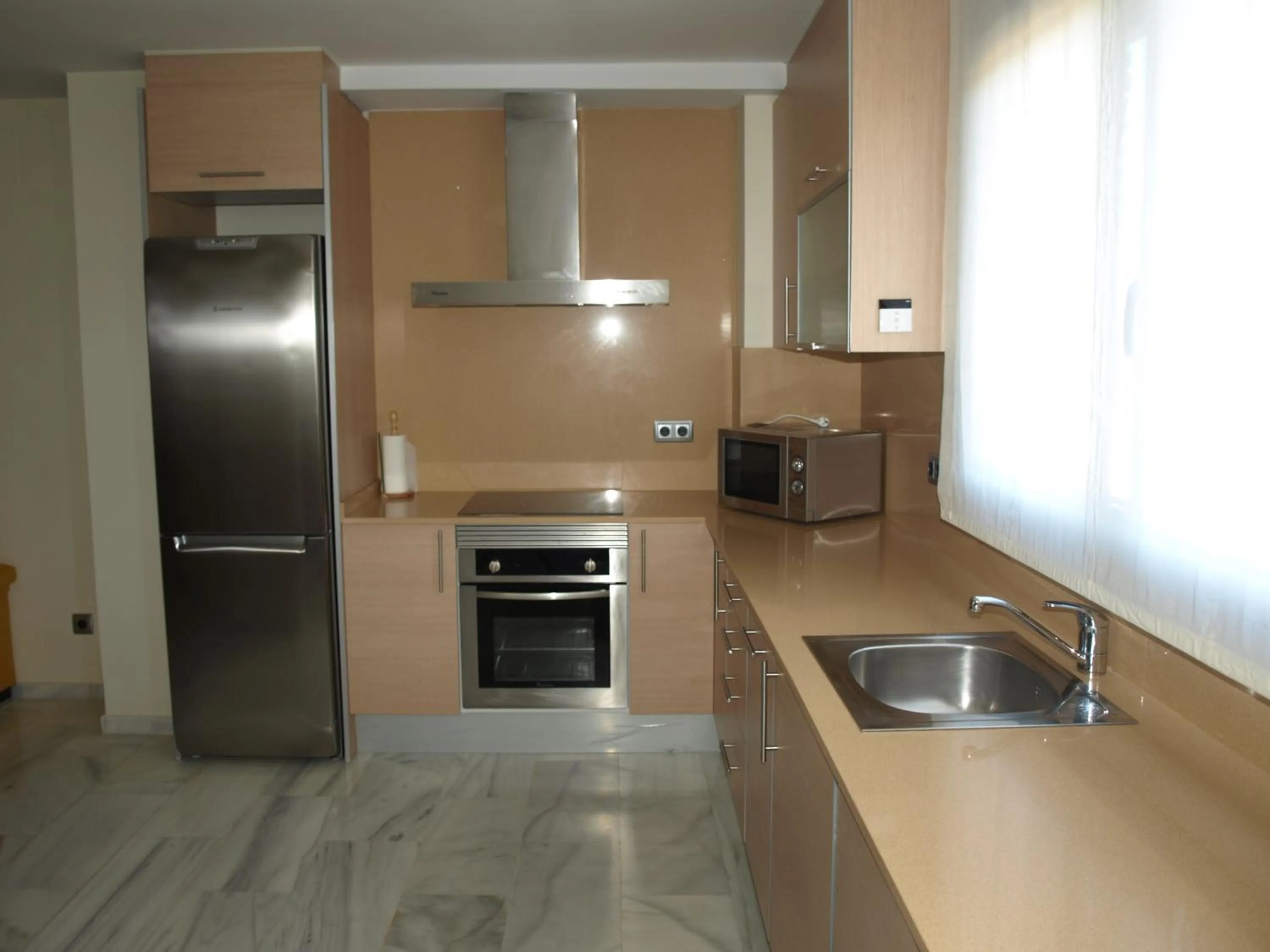 Kitchen or kitchenette in Aparthotel del Golf