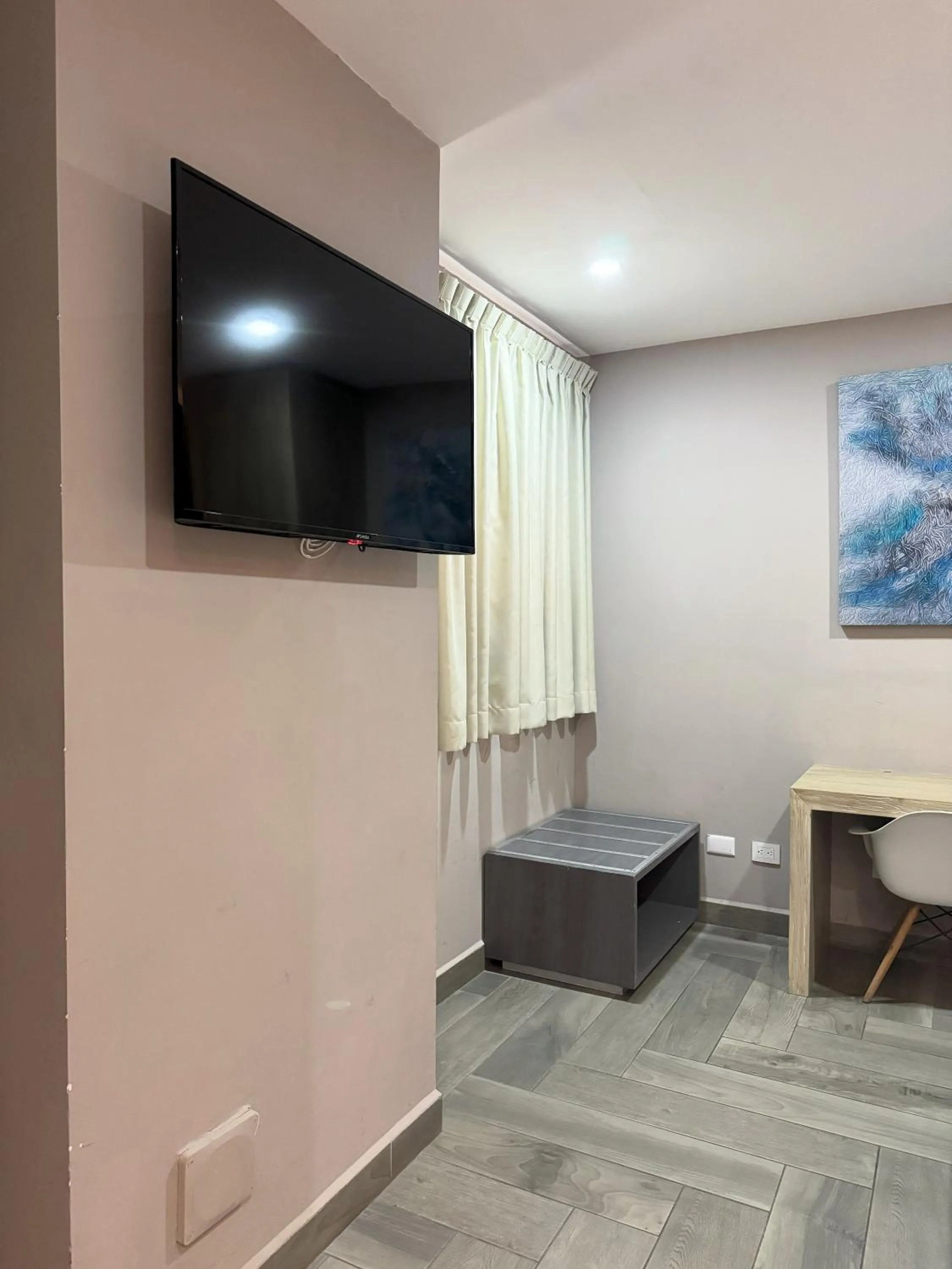 TV and multimedia in Illusion Xpress I Attraction Hotel Deluxe