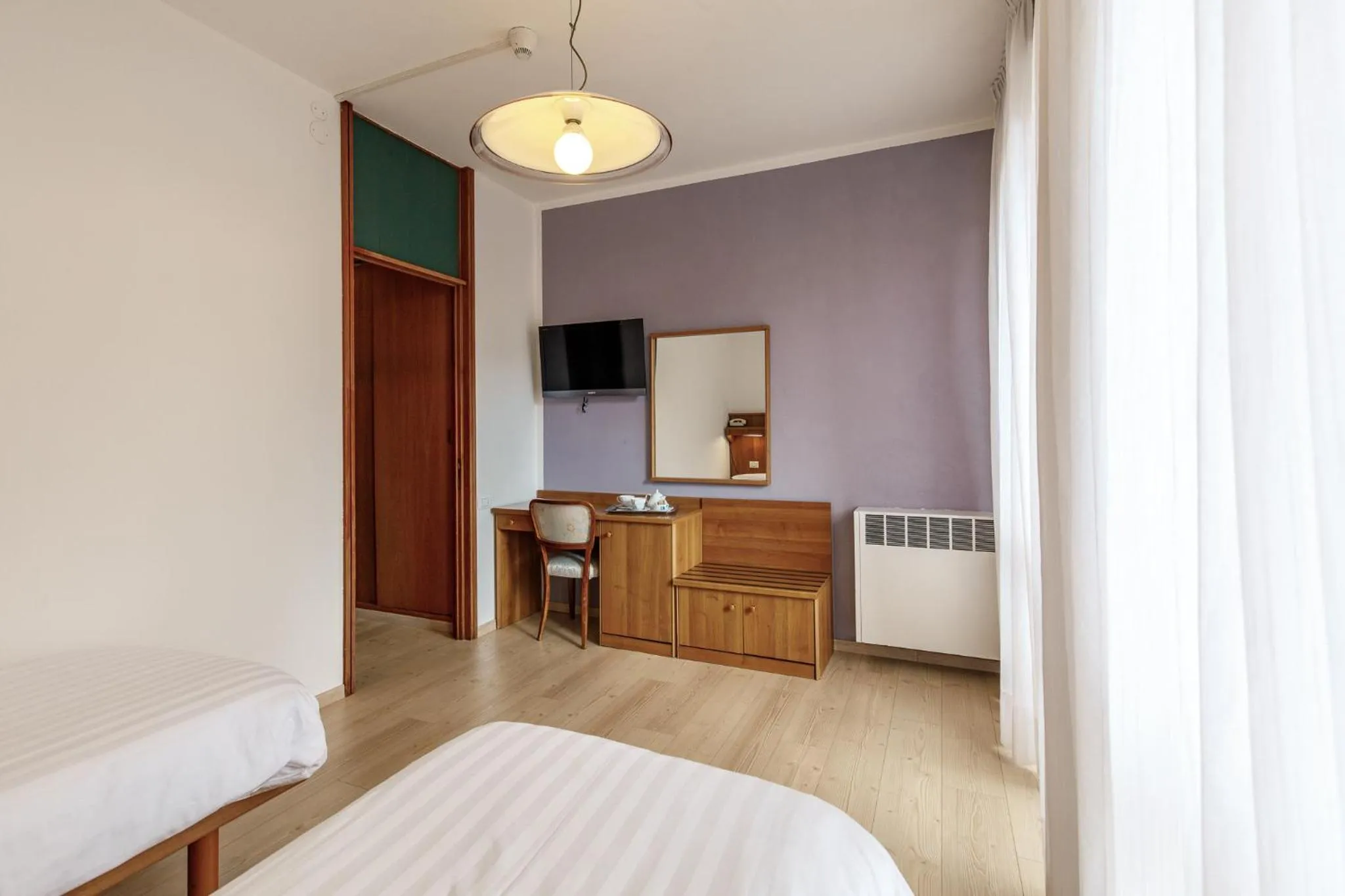 Bed in Albergo Belvedere