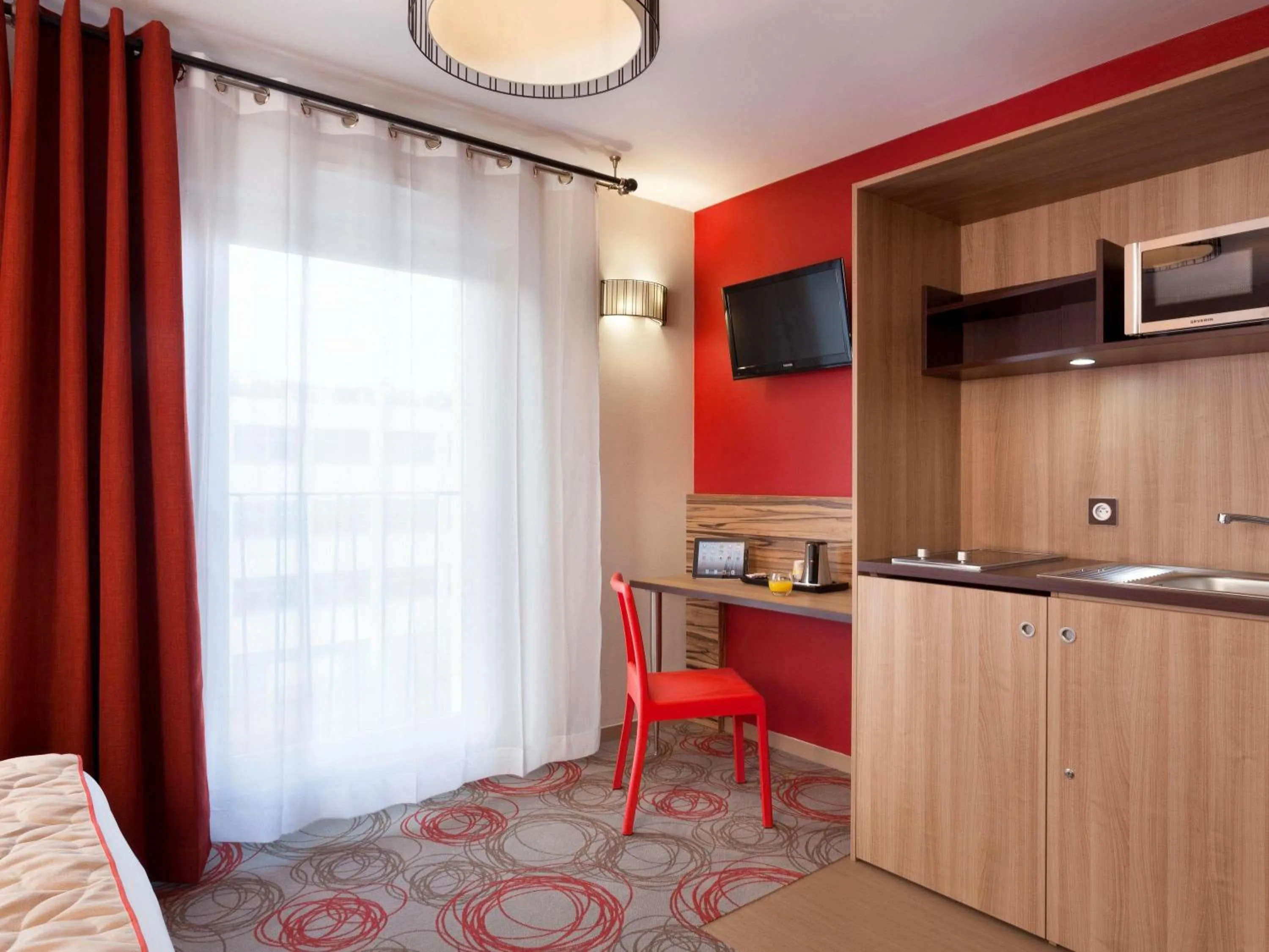 Bedroom in Aparthotel Adagio Lyon Patio Confluence