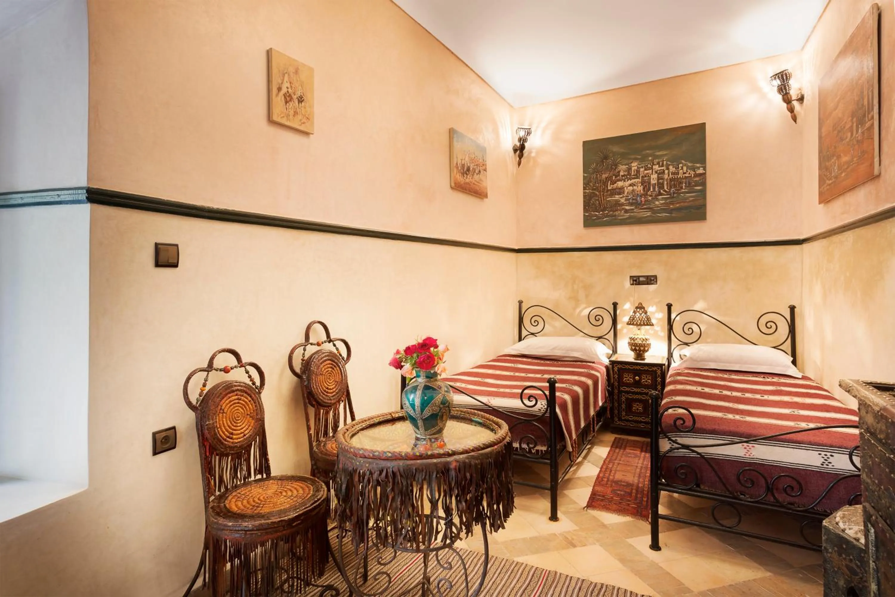Inner courtyard view, Bed in Riad Julia