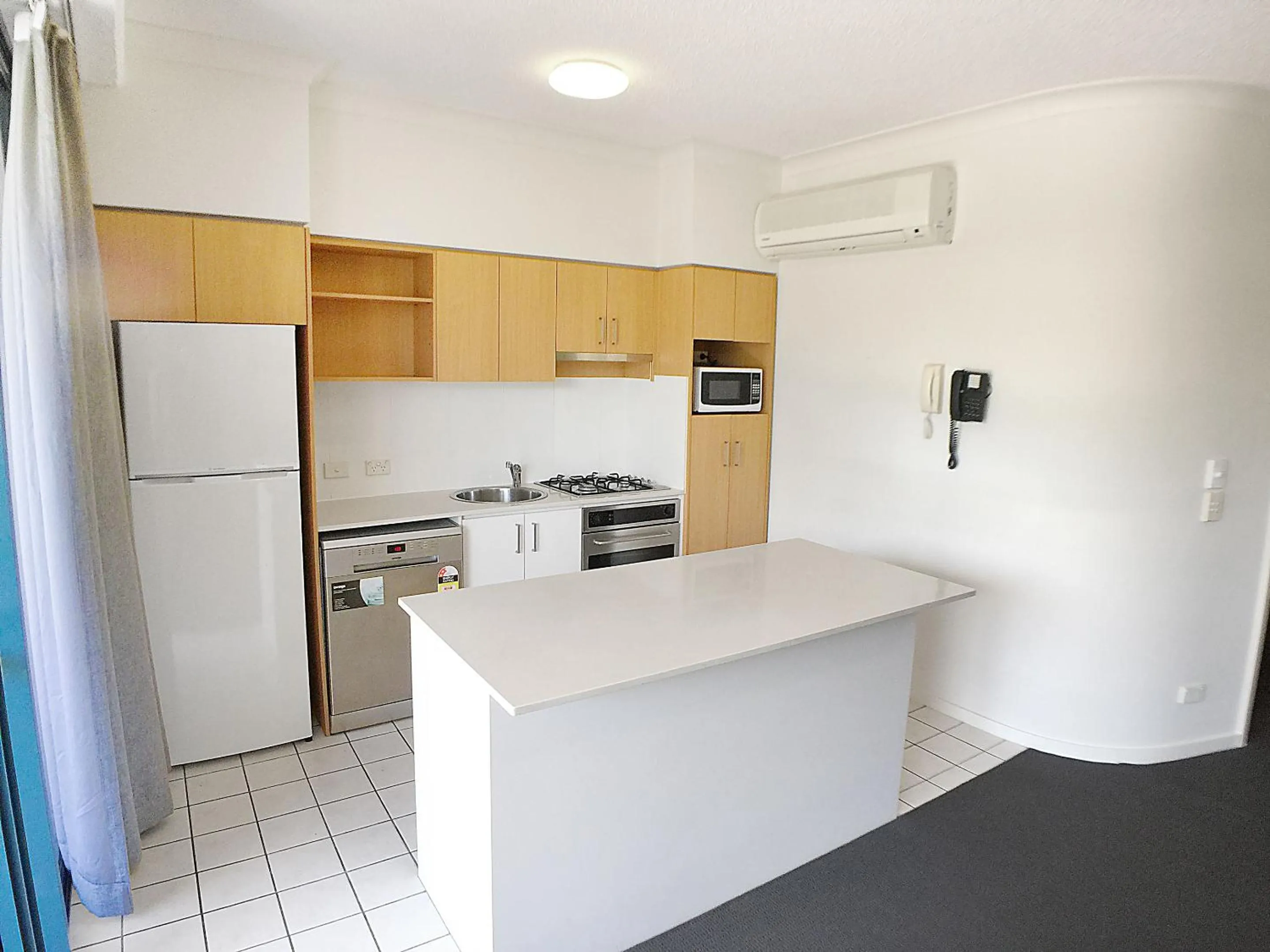 Kitchen or kitchenette in Inn on the Park Apartments