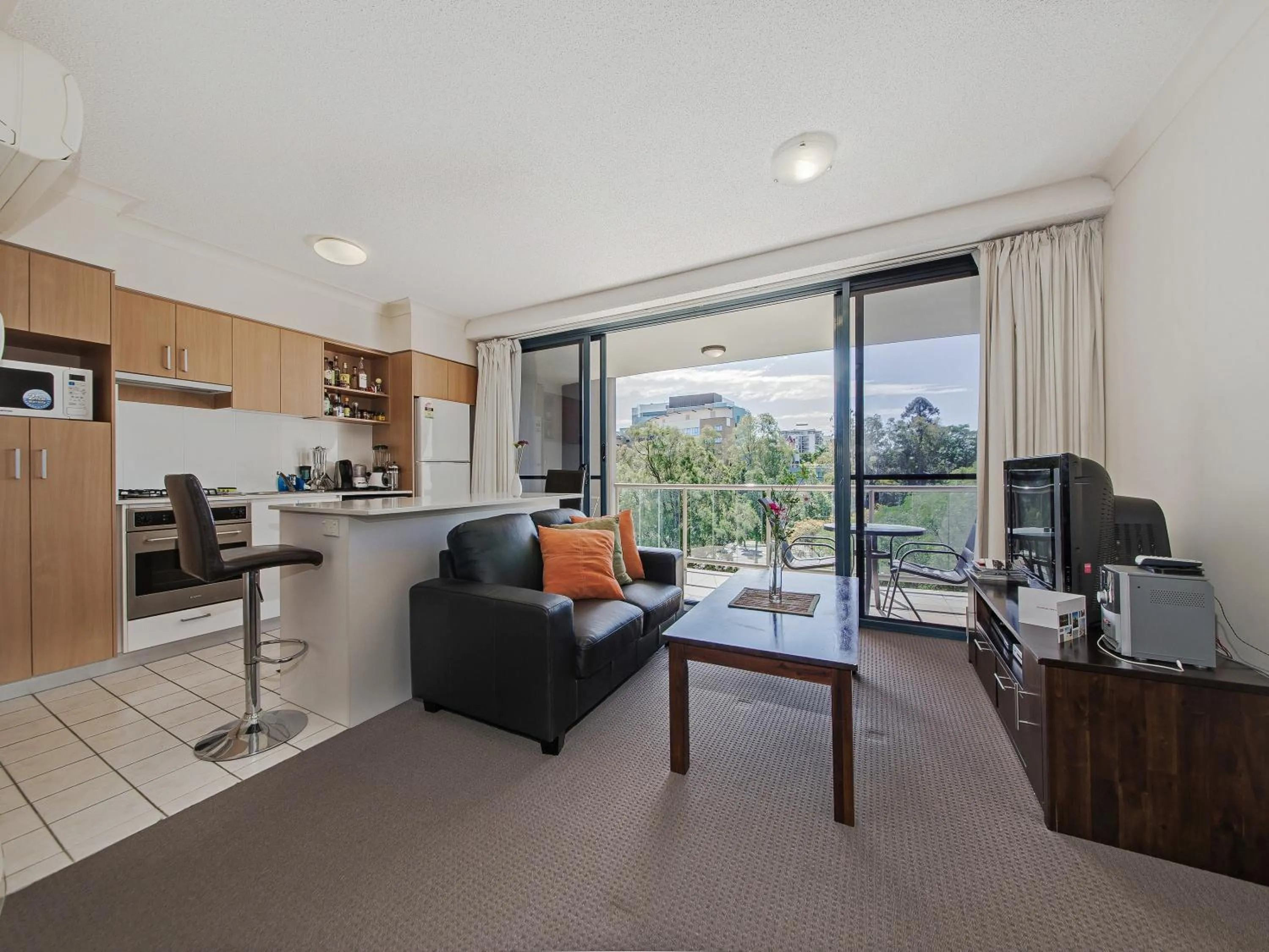 Living room in Inn on the Park Apartments
