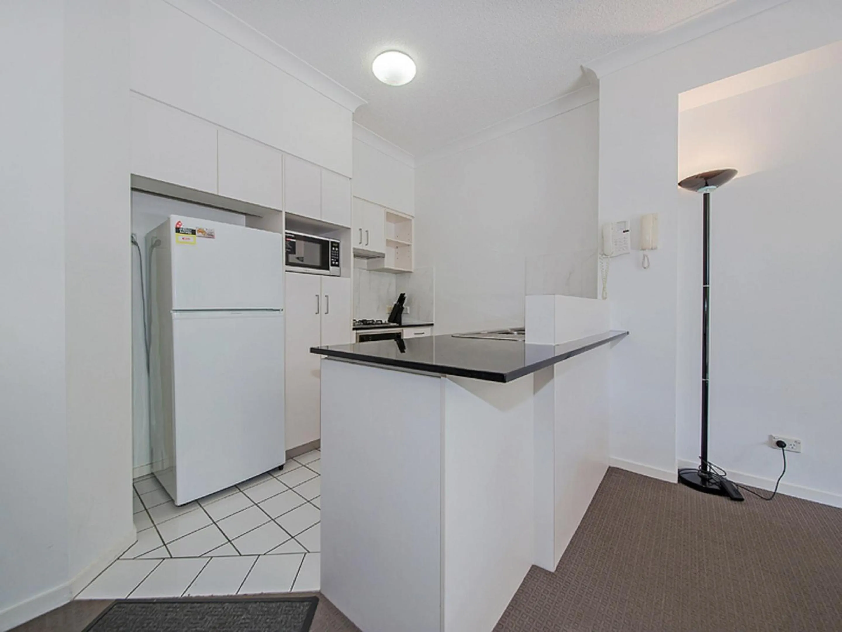 Kitchen or kitchenette in Inn on the Park Apartments