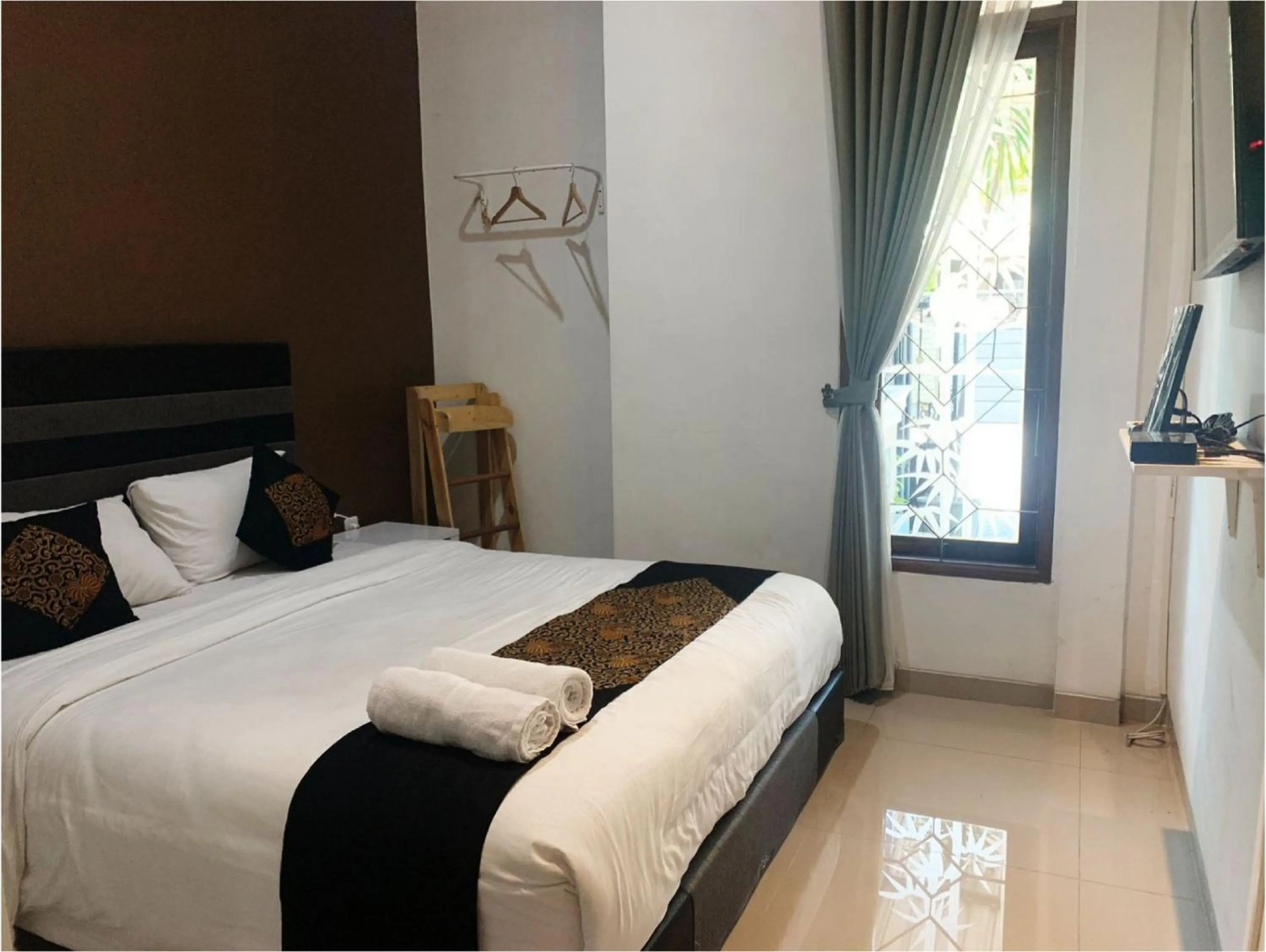 Bedroom, Bed in Tjahaja Baroe Syariah Mitra RedDoorz At Dukuh Kupang