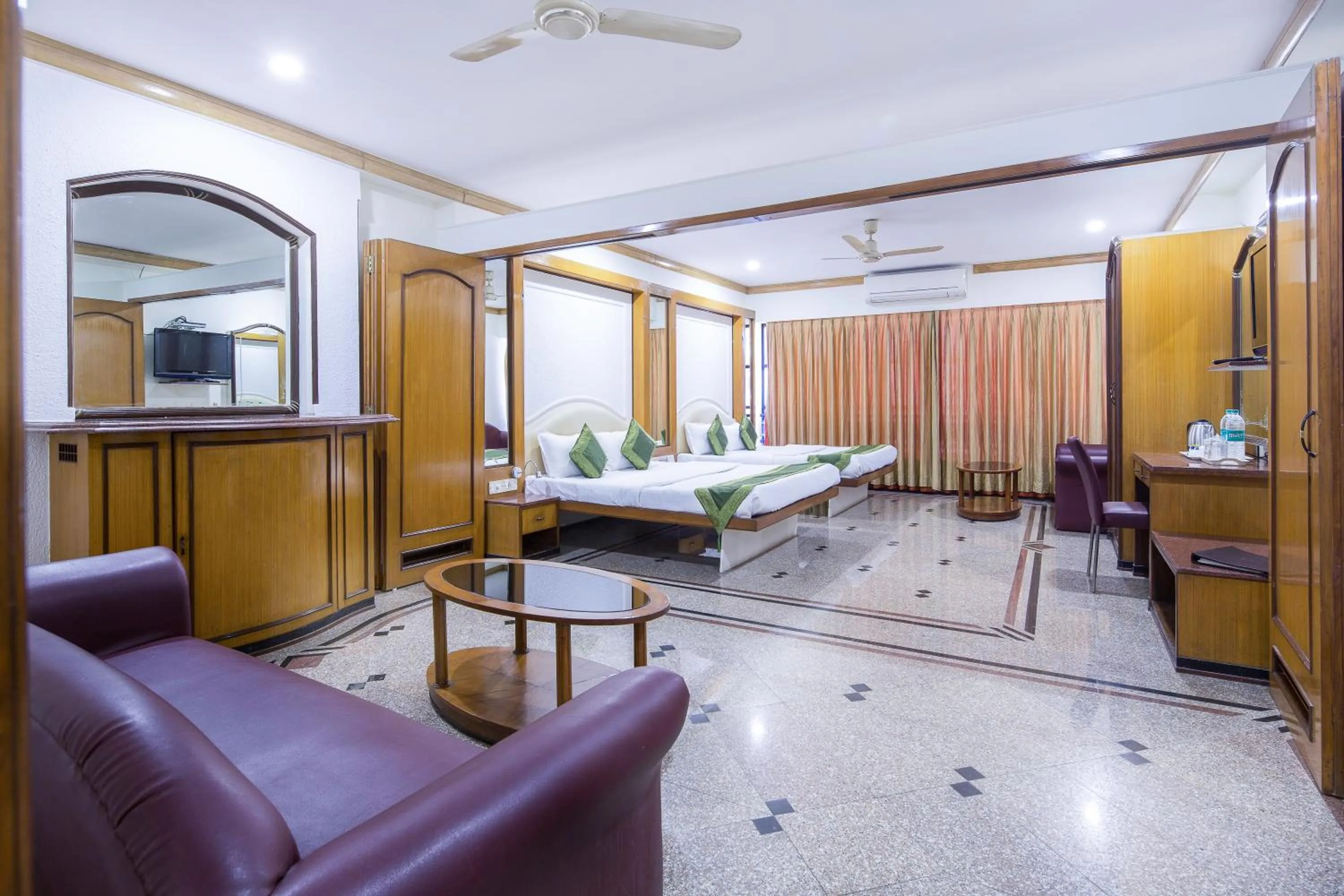 Seating area, Bed in Garden Hotel