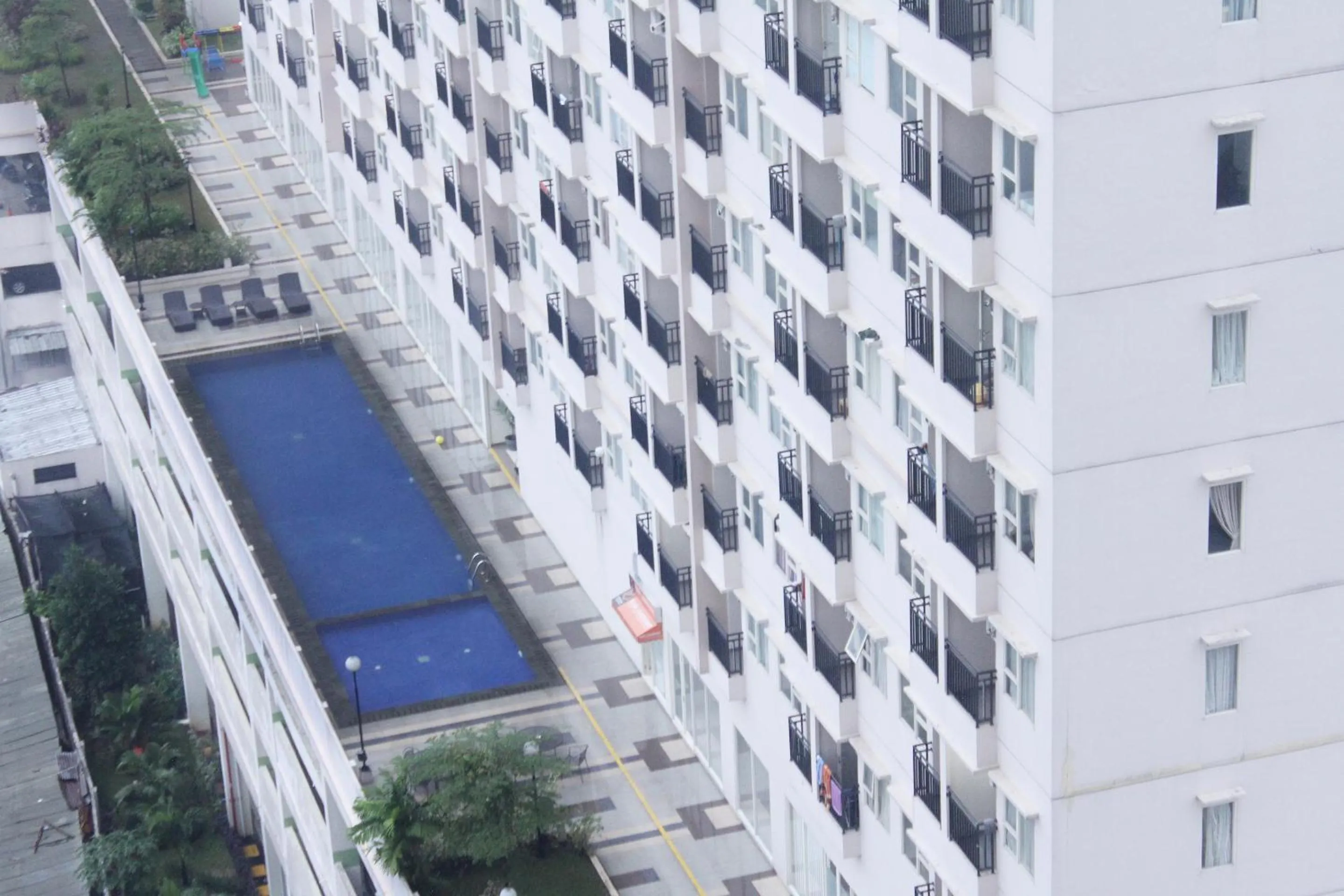 Swimming pool, Pool View in OYO 266 Margonda Residence 5