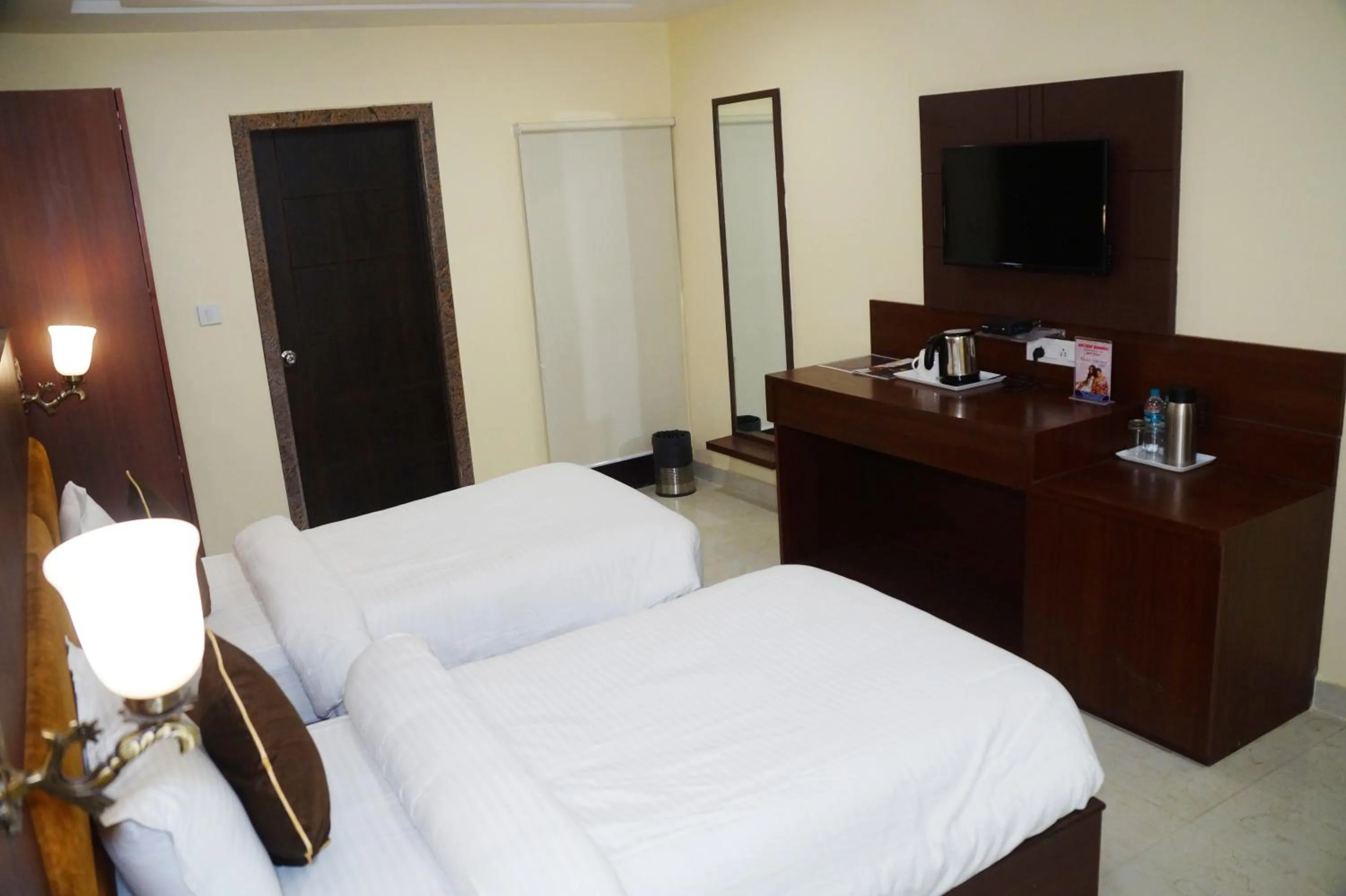 Bed in HOTEL SHIVOY GRAND