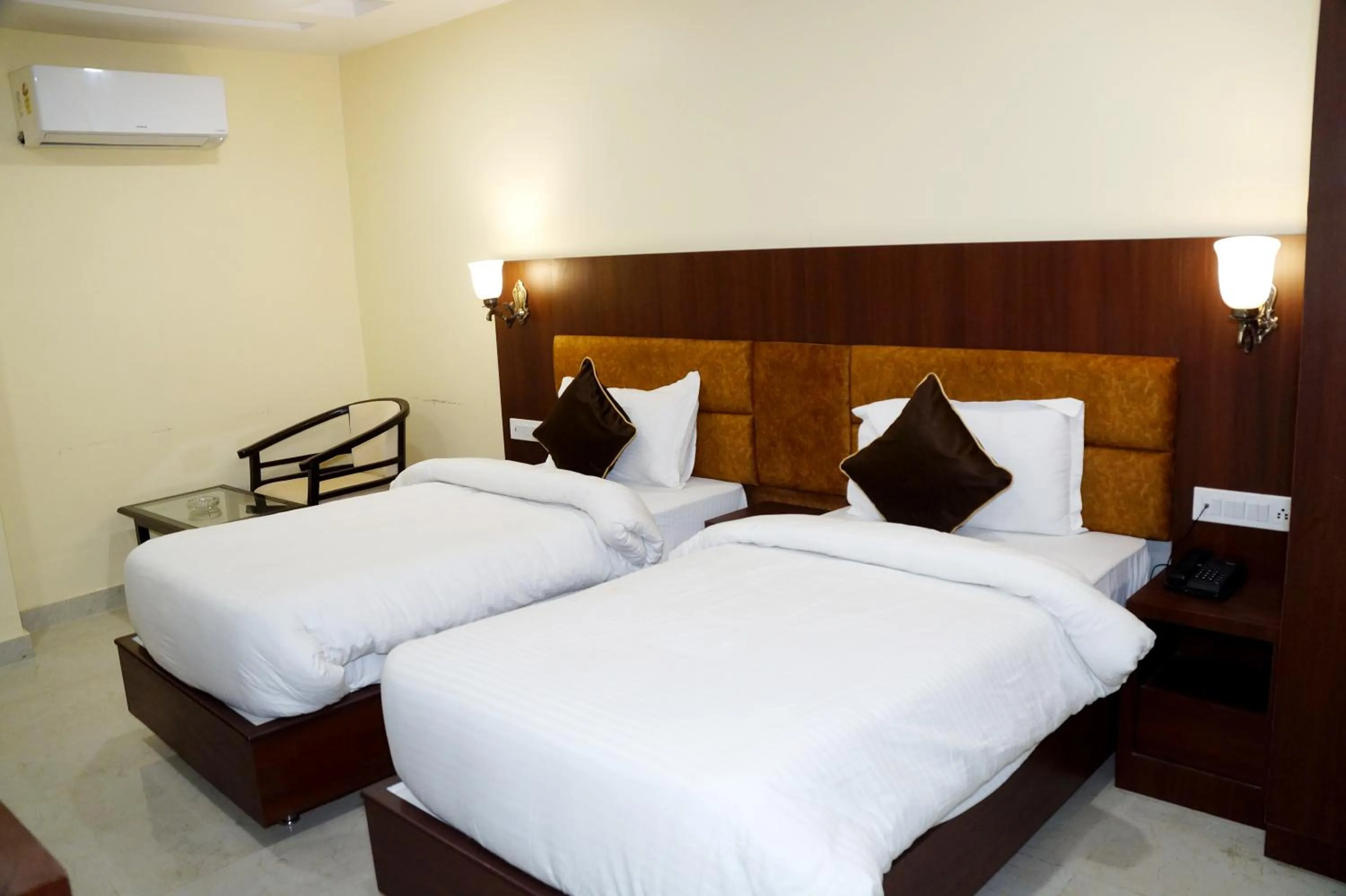 Bed in HOTEL SHIVOY GRAND