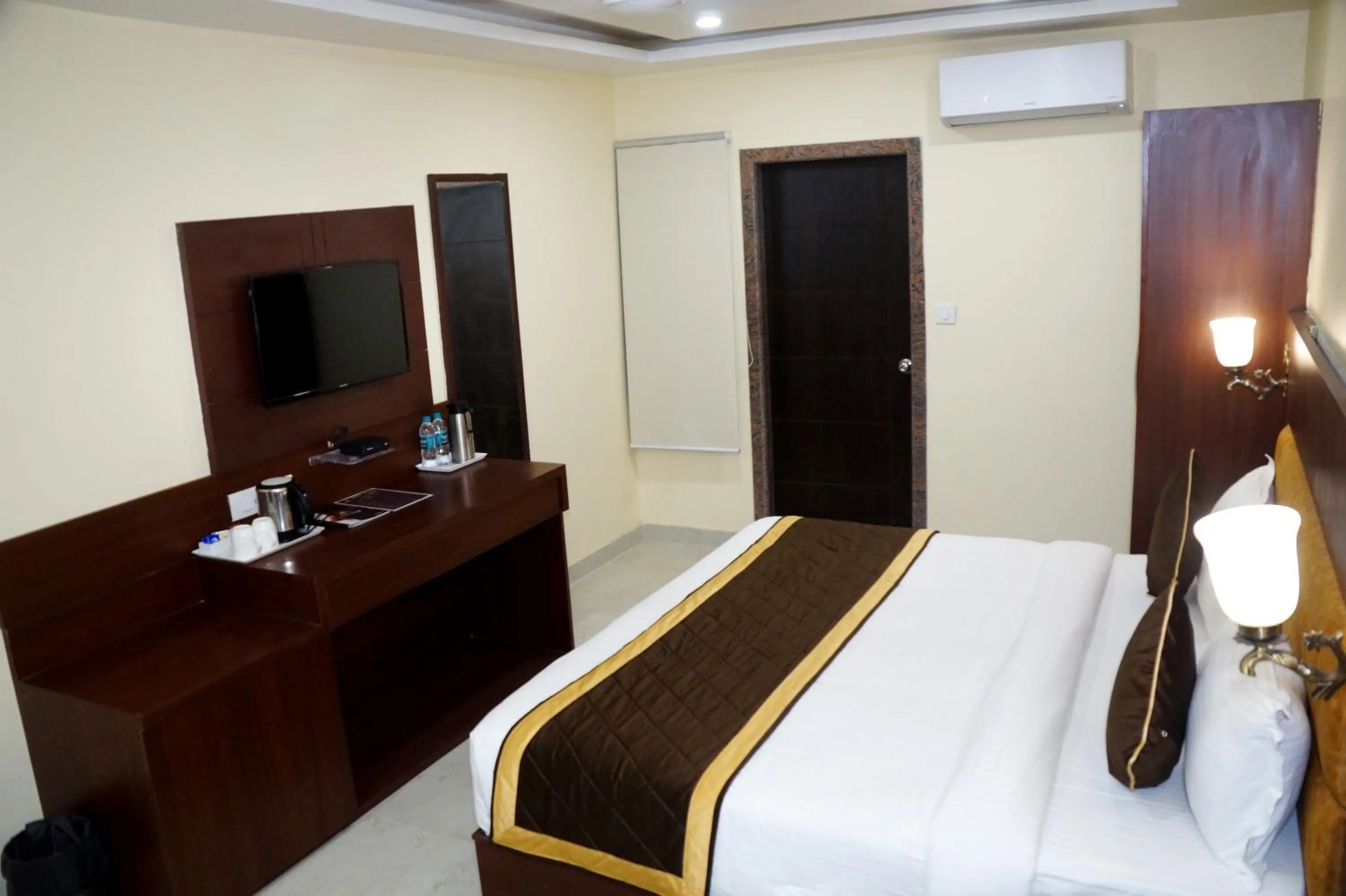 Photo of the whole room, Bed in HOTEL SHIVOY GRAND