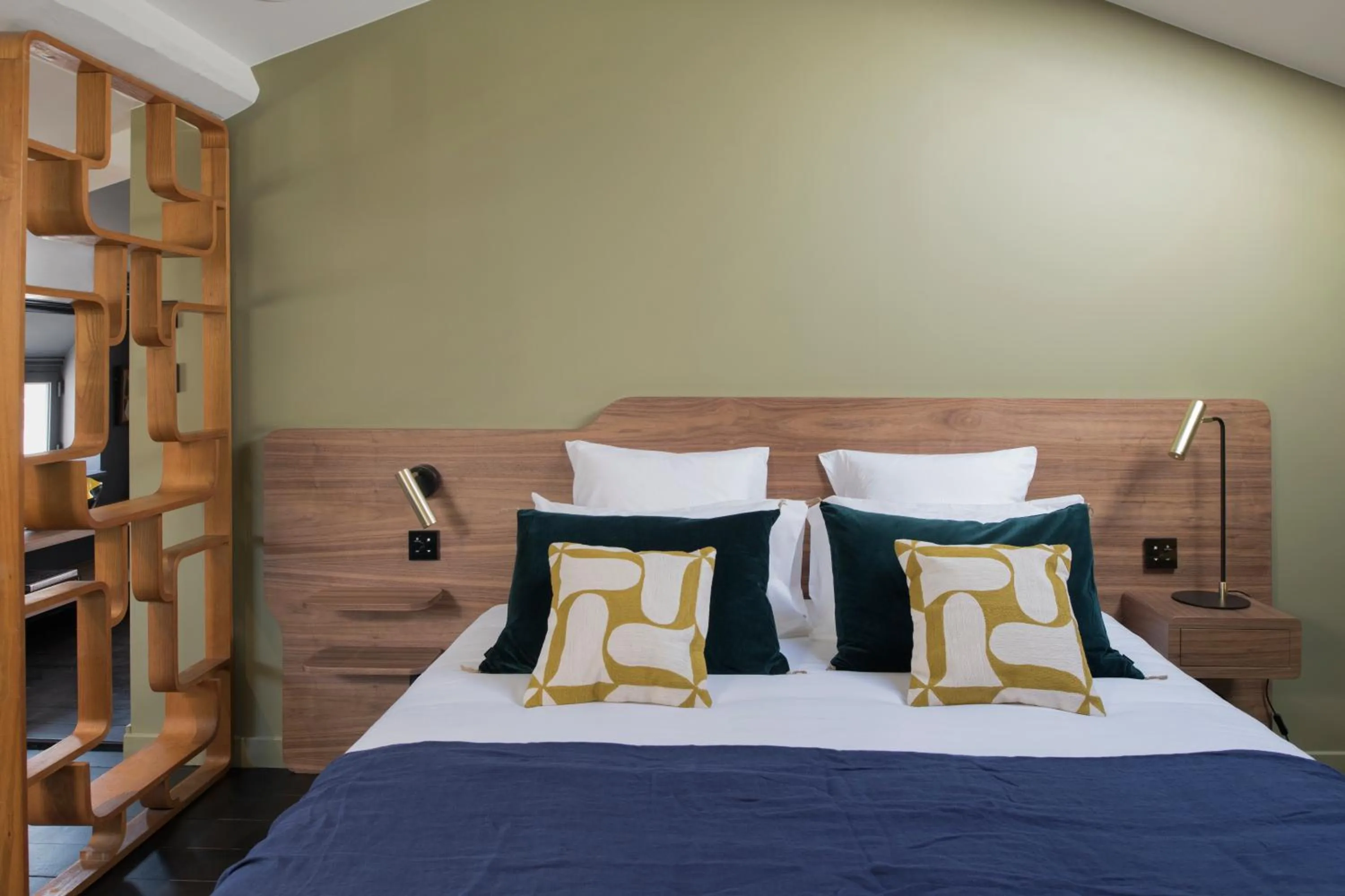 Bed in MiHotel Bellecour