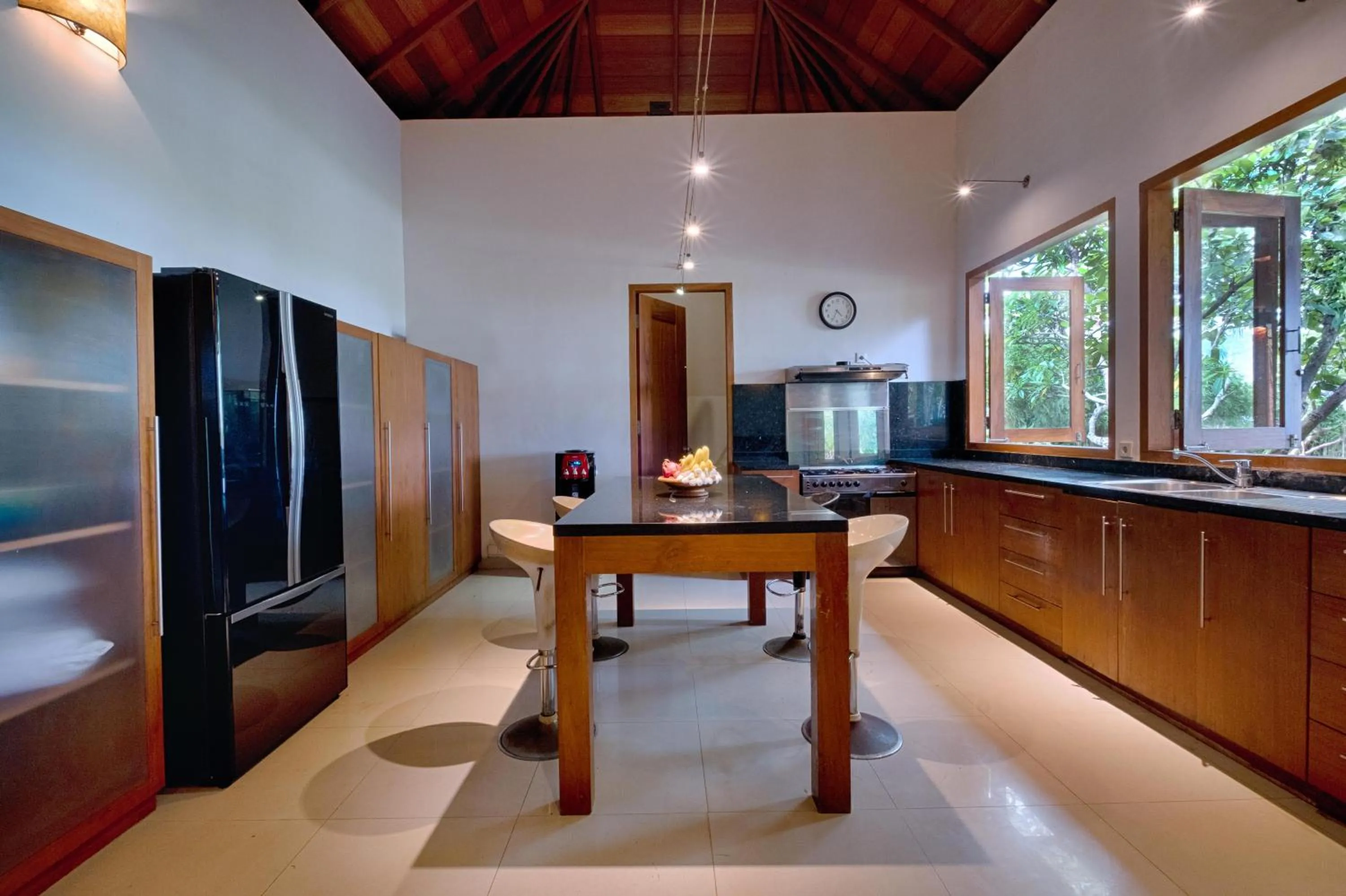 Kitchen or kitchenette in Ketewel Villa by Sanga Sanga Hospitality