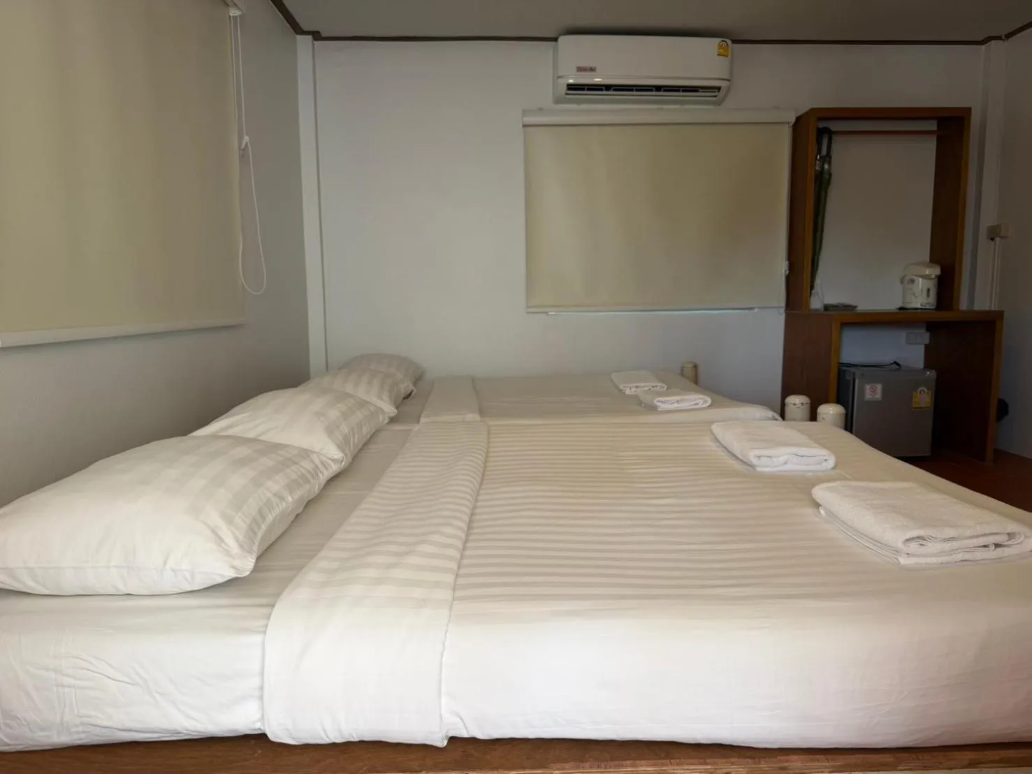 Bed in Baan Pun Sook Resort