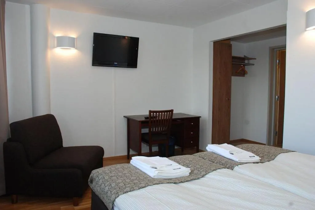 Seating area, Bed in Hotel Alvariini